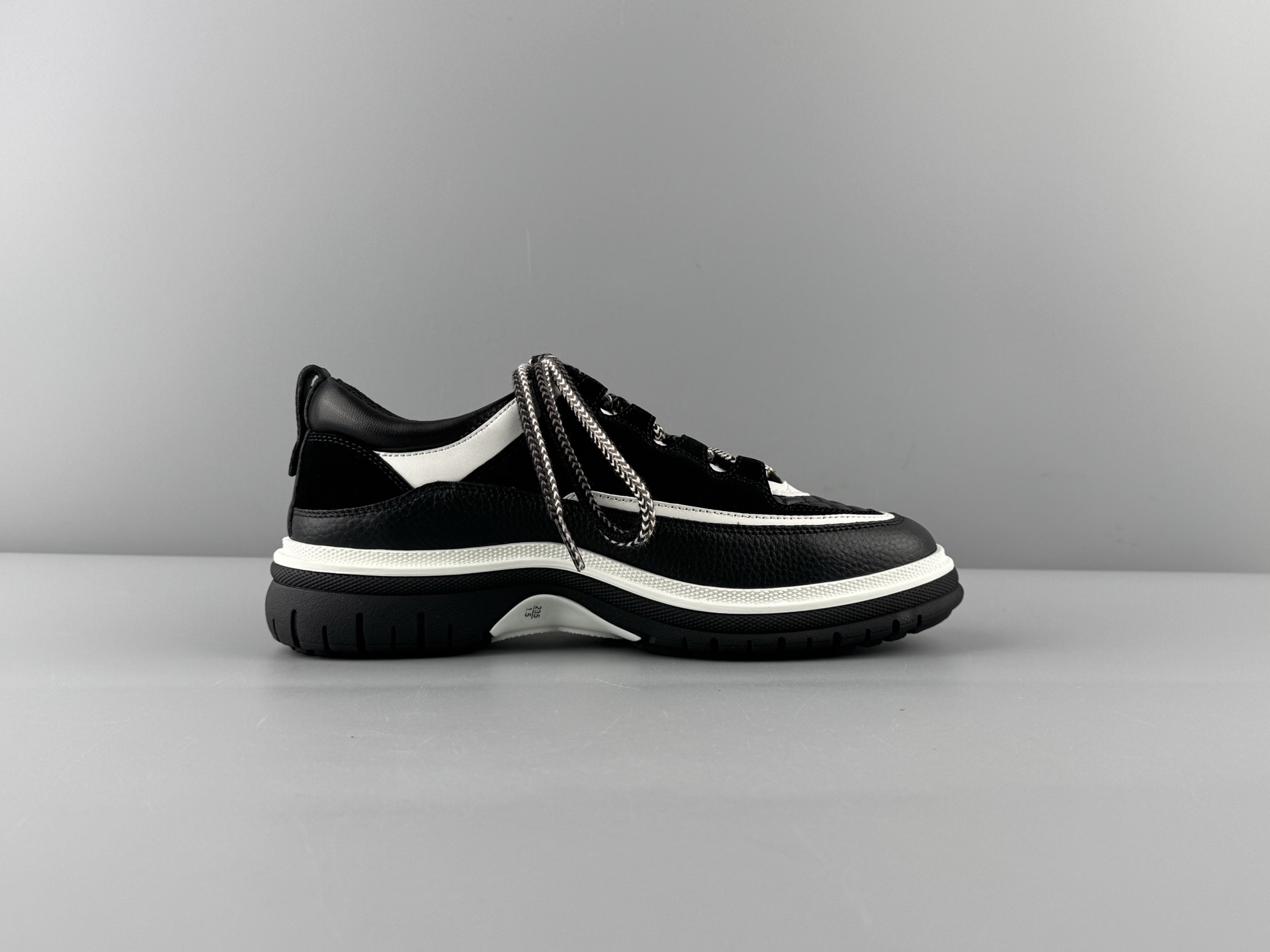 Chanel 25Cb Latest Teddy Panda Sneakers πΌ Patchwork design with contrasting quilted patterns Lace-up style with a chic British-inspired Chanel aesthetic Classic black and white color combination