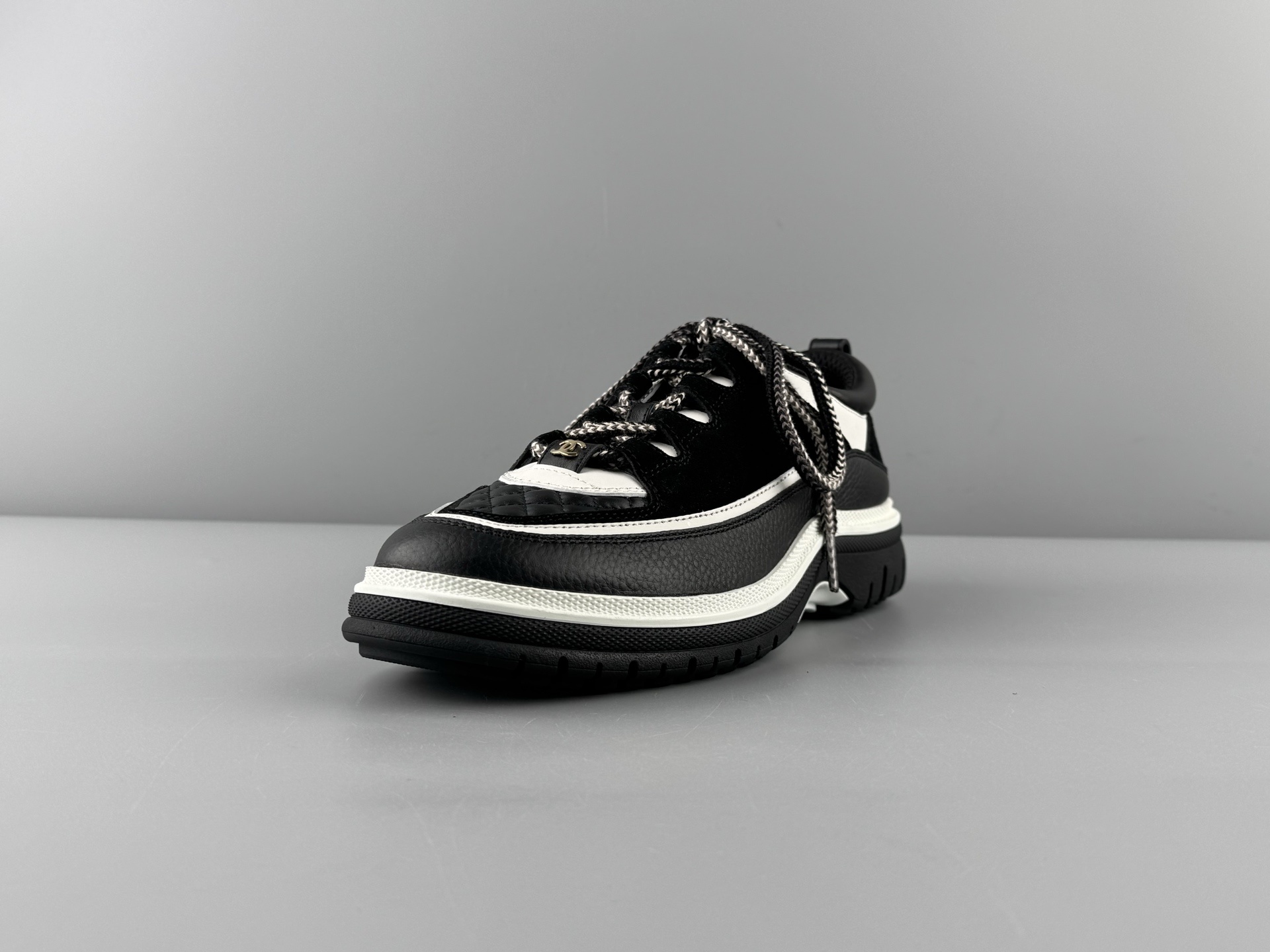 Chanel 25Cb Latest Teddy Panda Sneakers ๐ผ Patchwork design with contrasting quilted patterns Lace-up style with a chic British-inspired Chanel aesthetic Classic black and white color combination - Image 16