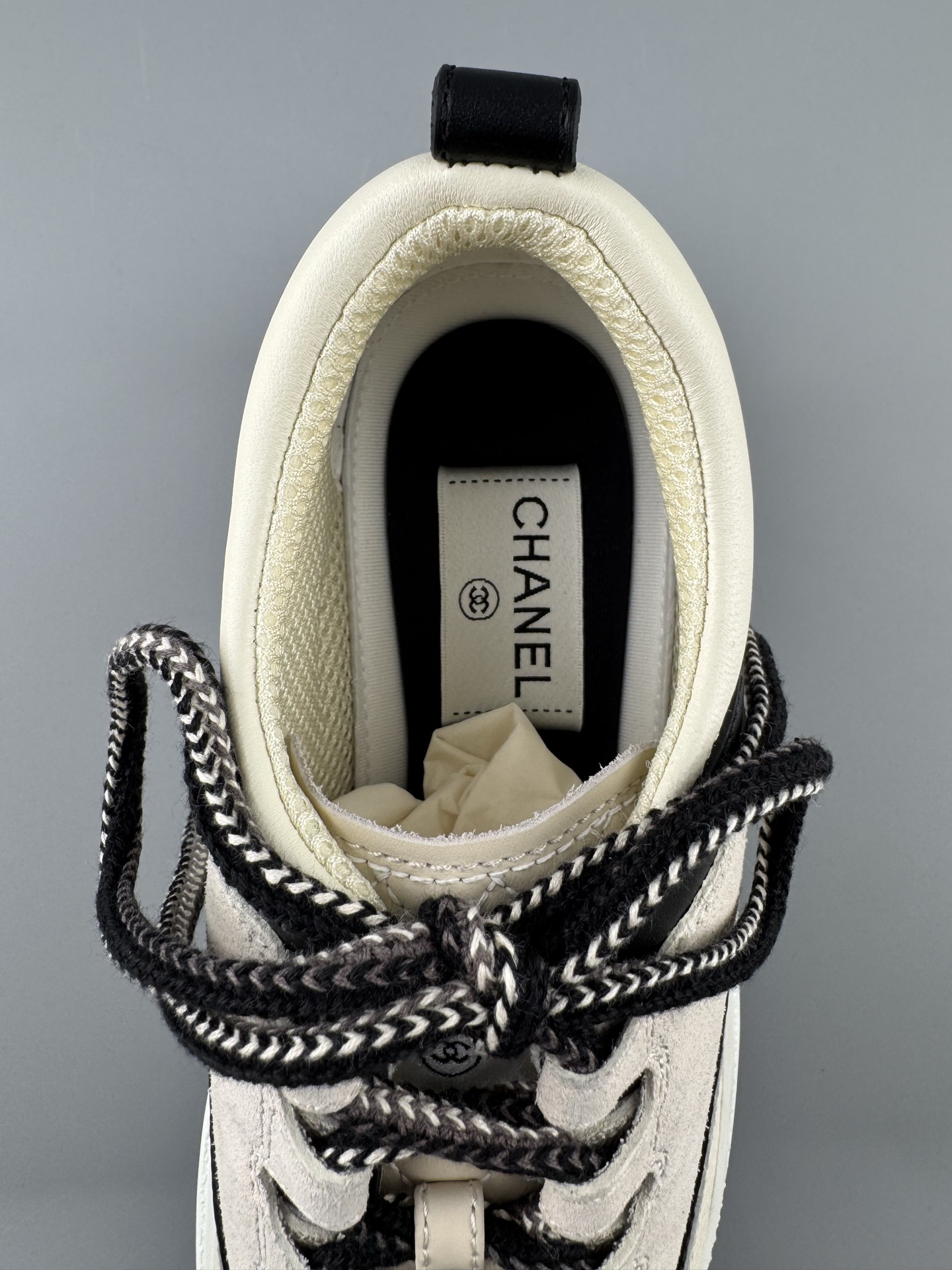 Chanel 25Cb Latest Teddy Panda Sneakers πΌ Patchwork design with contrasting quilted textures Lace-up style featuring a chic British-inspired Chanel look Classic black and white color combination - Image 4
