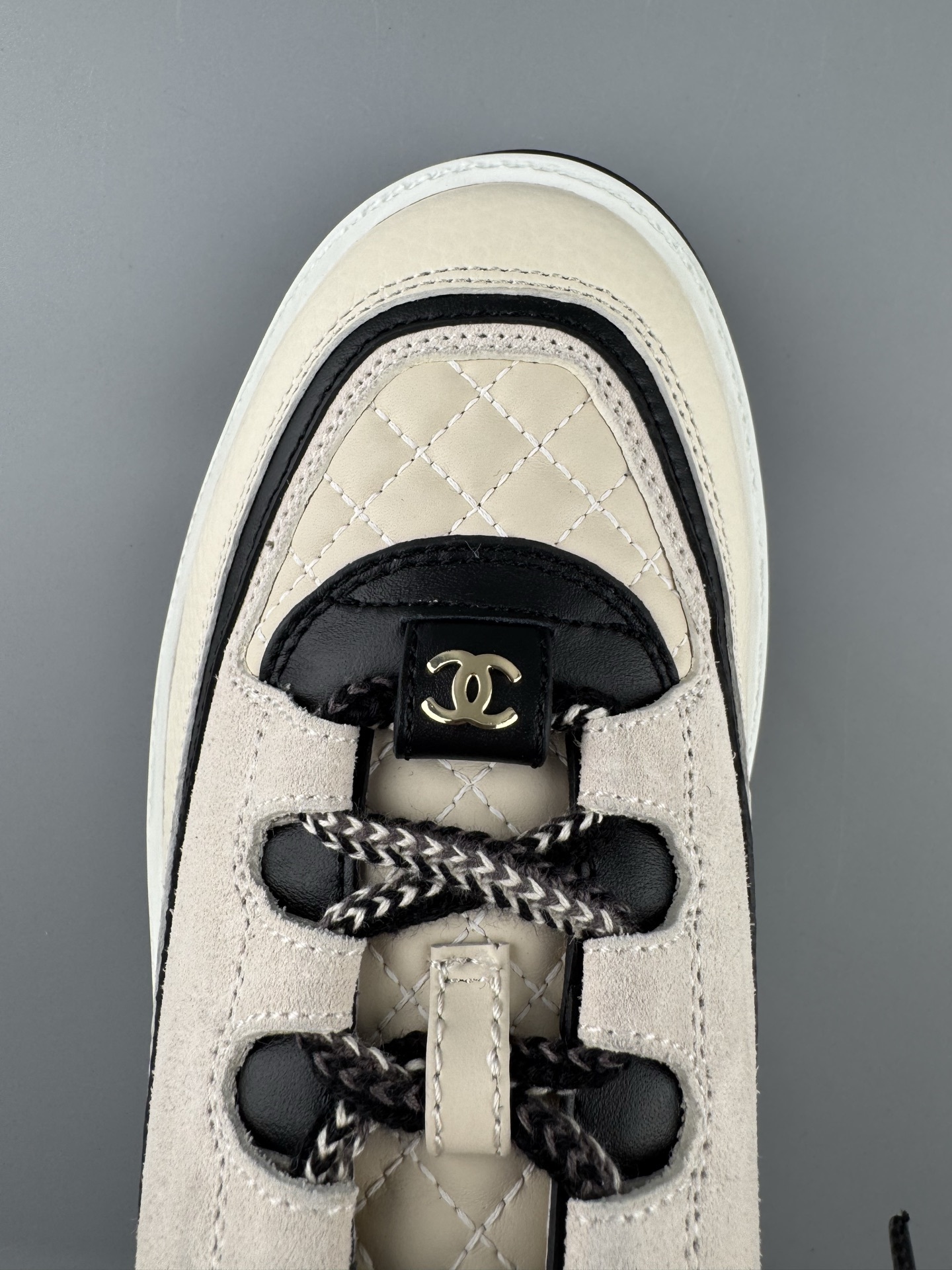 Chanel 25Cb Latest Teddy Panda Sneakers πΌ Patchwork design with contrasting quilted textures Lace-up style featuring a chic British-inspired Chanel look Classic black and white color combination - Image 7