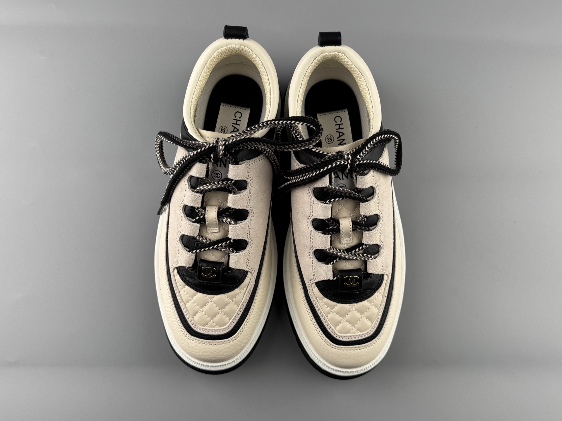 Chanel 25Cb Latest Teddy Panda Sneakers πΌ Patchwork design with contrasting quilted textures Lace-up style featuring a chic British-inspired Chanel look Classic black and white color combination - Image 10