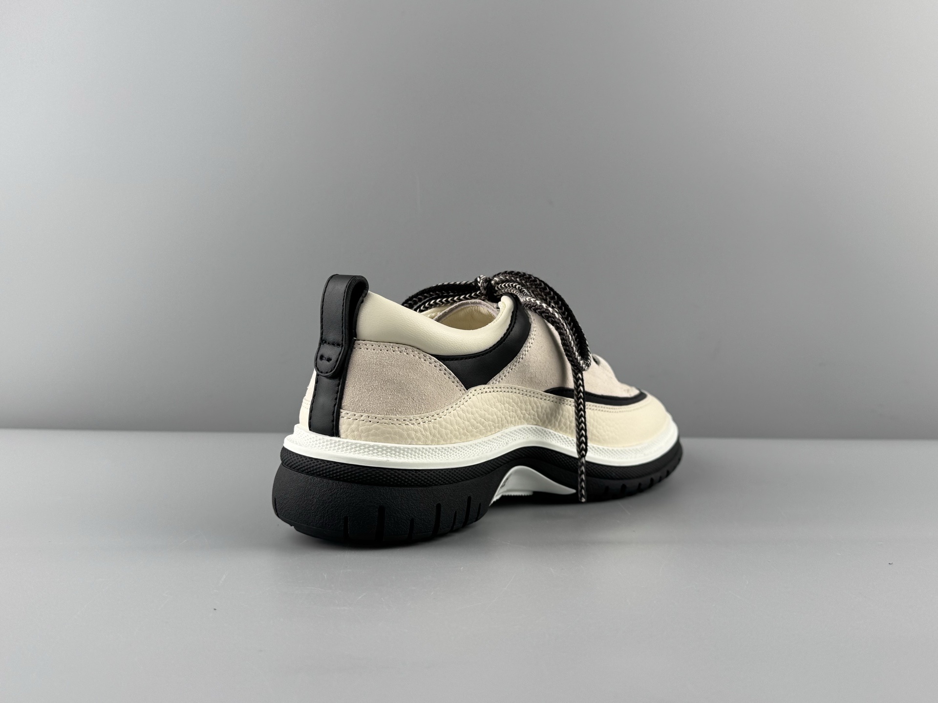 Chanel 25Cb Latest Teddy Panda Sneakers πΌ Patchwork design with contrasting quilted textures Lace-up style featuring a chic British-inspired Chanel look Classic black and white color combination - Image 11