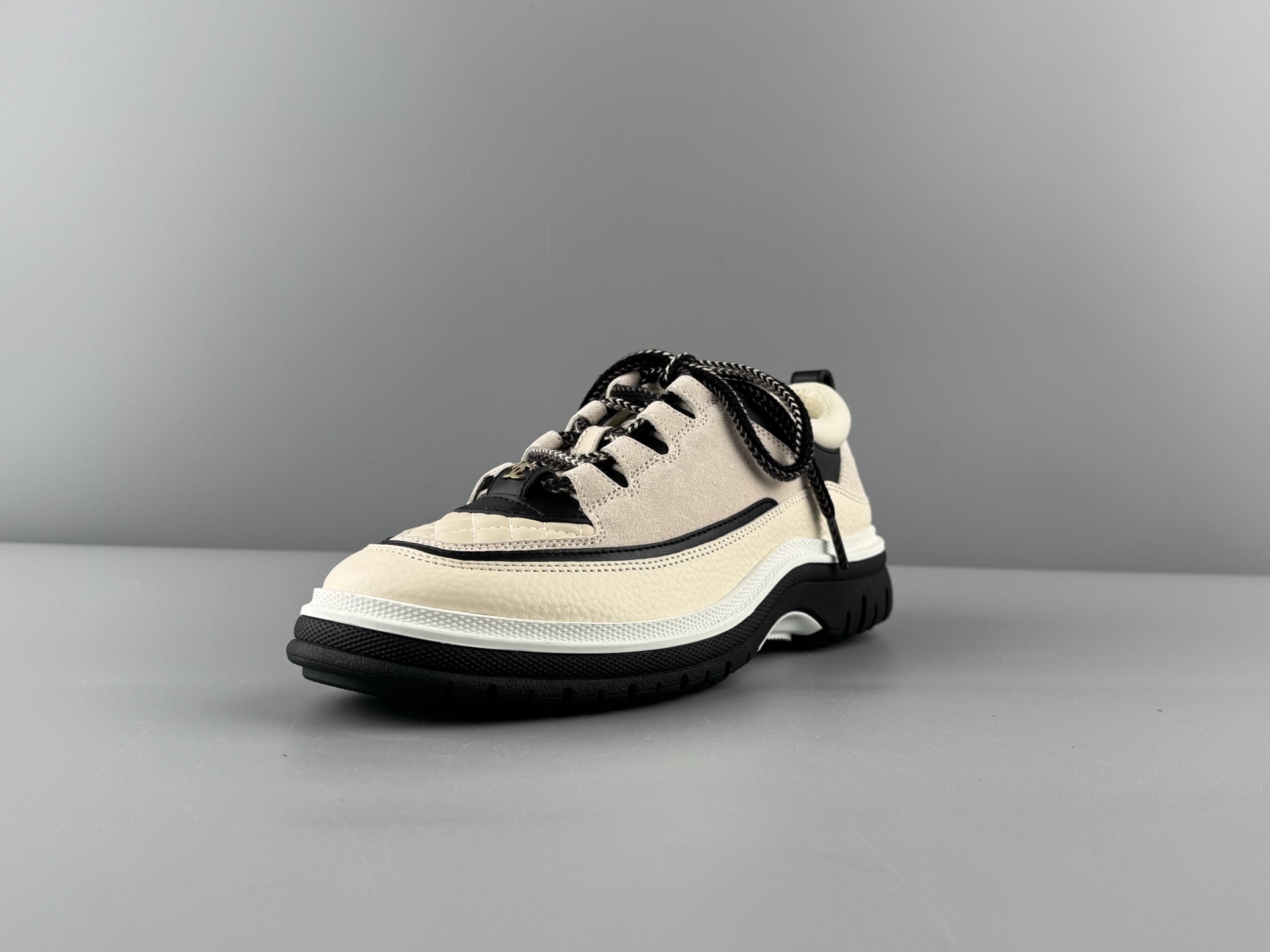 Chanel 25Cb Latest Teddy Panda Sneakers πΌ Patchwork design with contrasting quilted textures Lace-up style featuring a chic British-inspired Chanel look Classic black and white color combination - Image 12