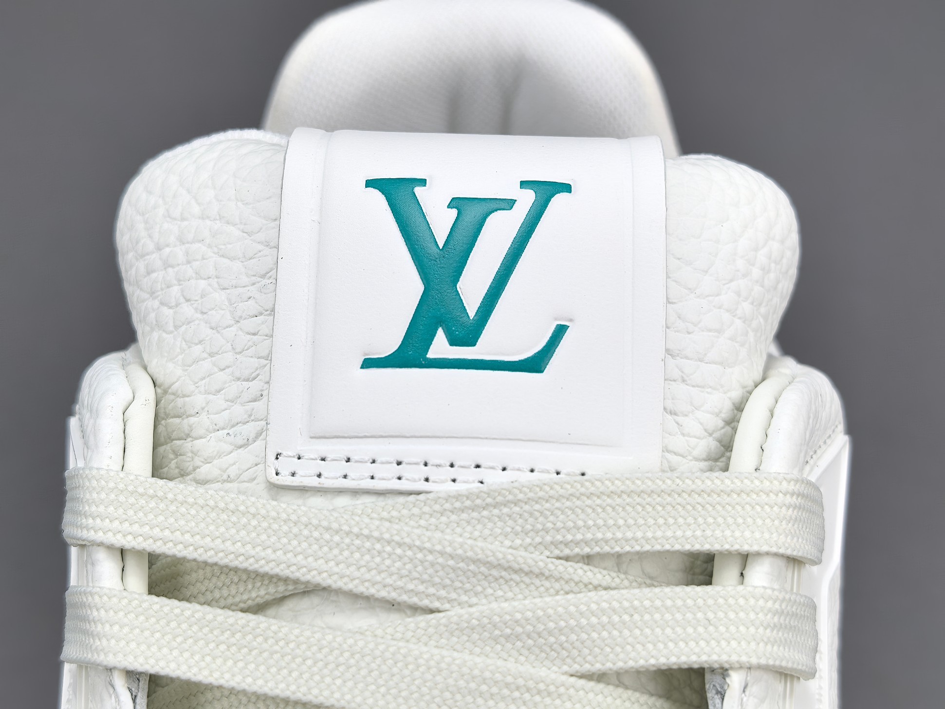 LV Trainer 2025 Cruise 🛳️ Limited Edition Designed by Virgil Abloh, this exclusive edition draws inspiration from vintage basketball sneakers, reinterpreting them through Louis Vuitton’s signature luxury craftsmanship. - Image 5