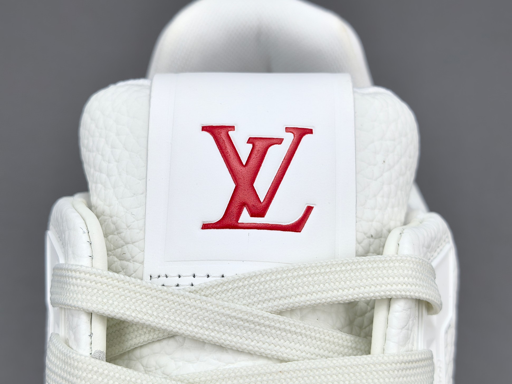 LV Trainer 2025 Cruise 🛳️ Limited Edition Designed by Virgil Abloh, this limited-edition LV Trainer takes inspiration from vintage basketball sneakers, merging classic sport style with Louis Vuitton’s signature luxury craftsmanship. - Image 5