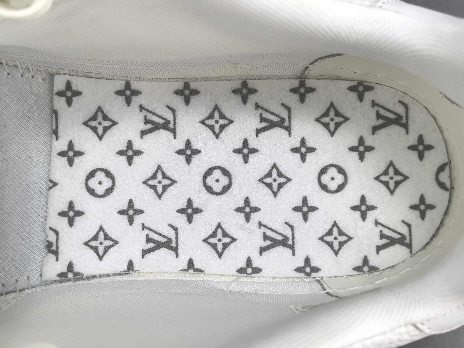 LV Trainer 2025 Cruise 🛳️ Limited Edition Designed by Virgil Abloh, this limited-edition LV Trainer takes inspiration from vintage basketball sneakers, merging classic sport style with Louis Vuitton’s signature luxury craftsmanship. - Image 9