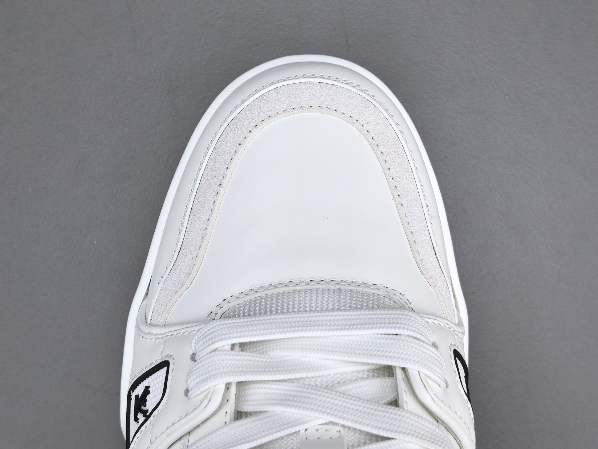 LOUIS VUITTON x Nigo Collaboration – FW25 Trainer A luxurious men’s low-top sneaker from the FW25 collection, blending Louis Vuitton’s refined craftsmanship with Nigo’s distinctive streetwear flair. - Image 3