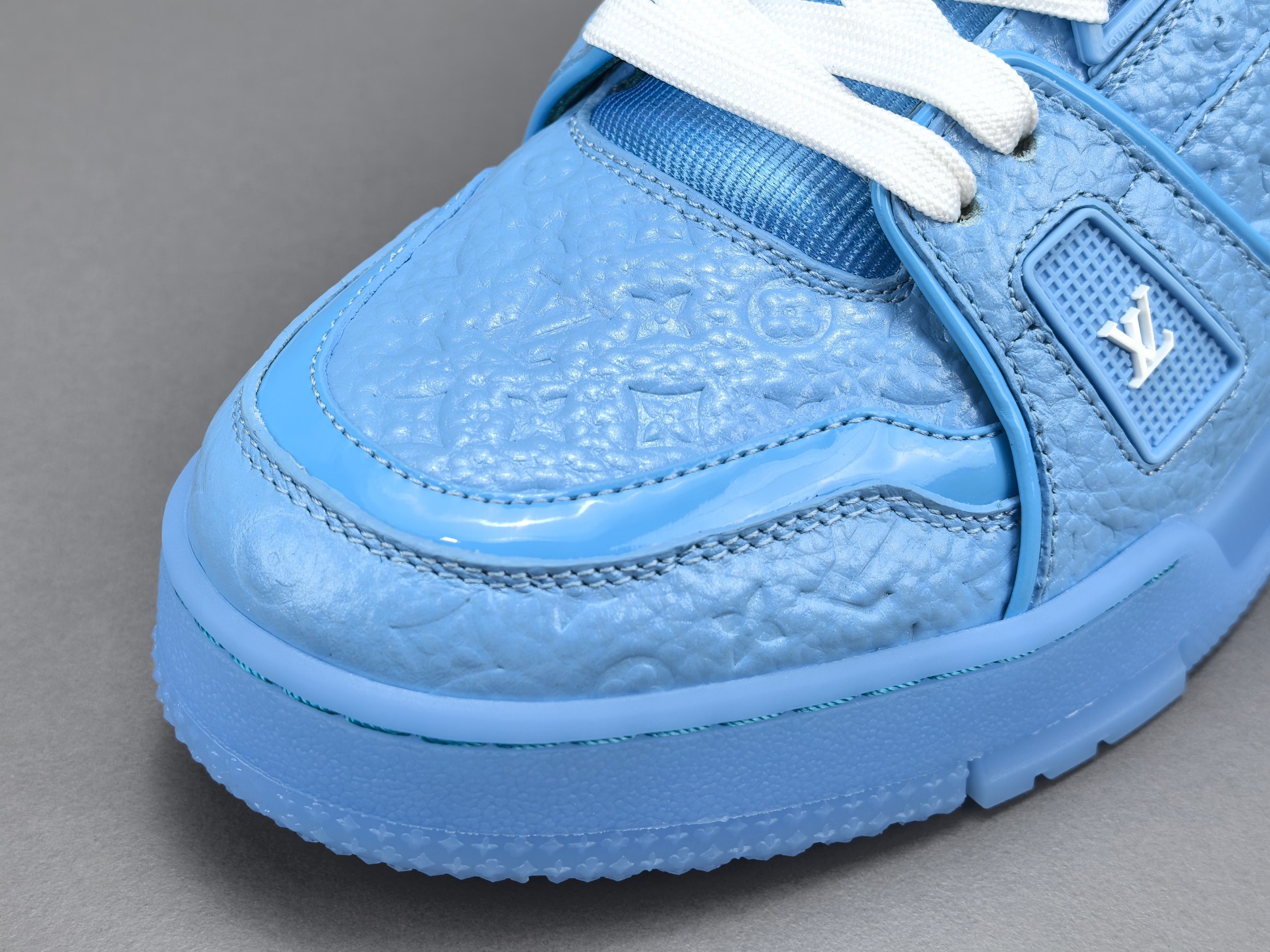 Louis Vuitton Trainer 2025 Edition Designed under the creative vision of Virgil Abloh, this LV Trainer draws inspiration from vintage basketball sneakers, blending heritage aesthetics with modern luxury. - Image 2