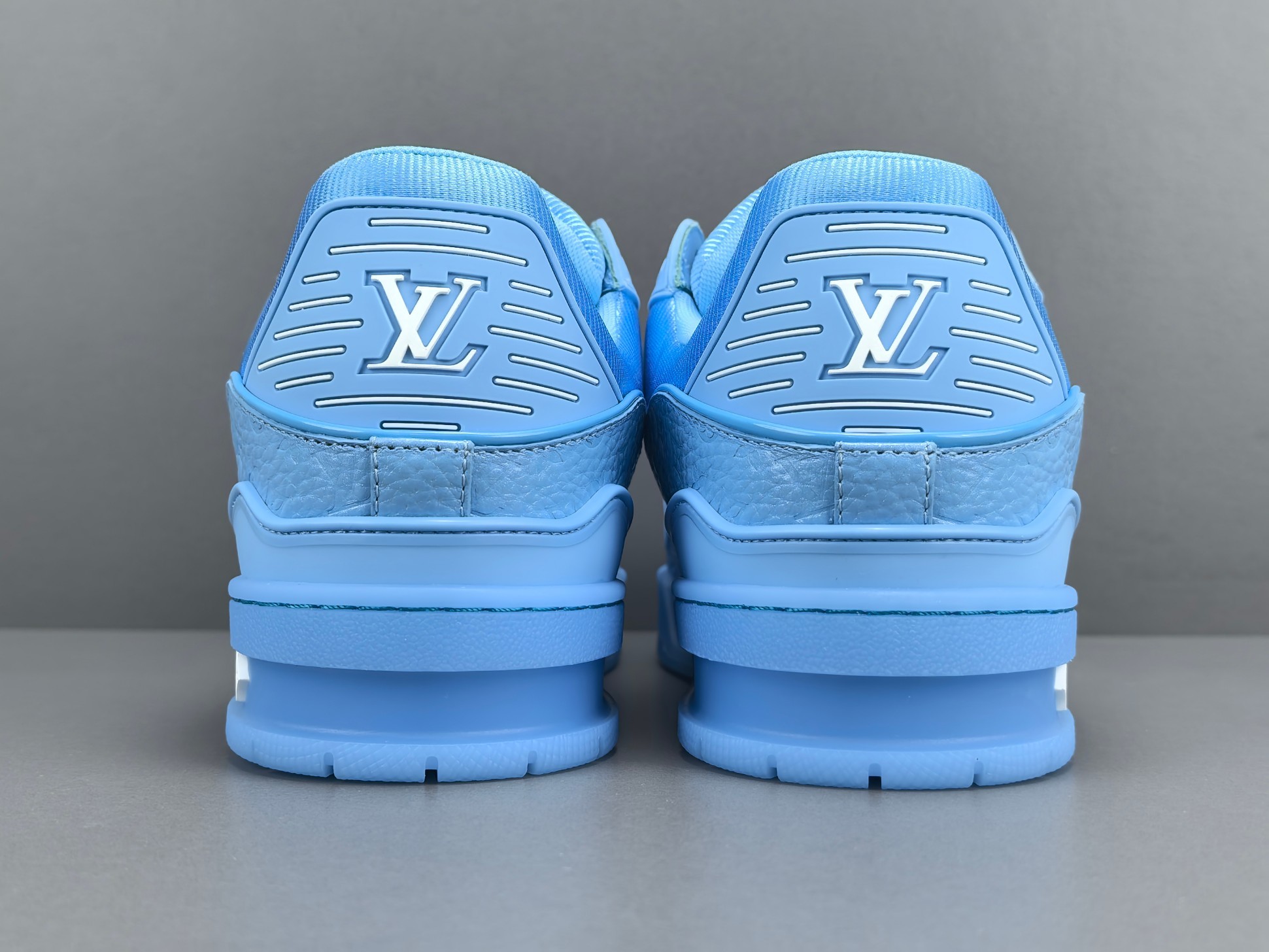 Louis Vuitton Trainer 2025 Edition Designed under the creative vision of Virgil Abloh, this LV Trainer draws inspiration from vintage basketball sneakers, blending heritage aesthetics with modern luxury. - Image 11