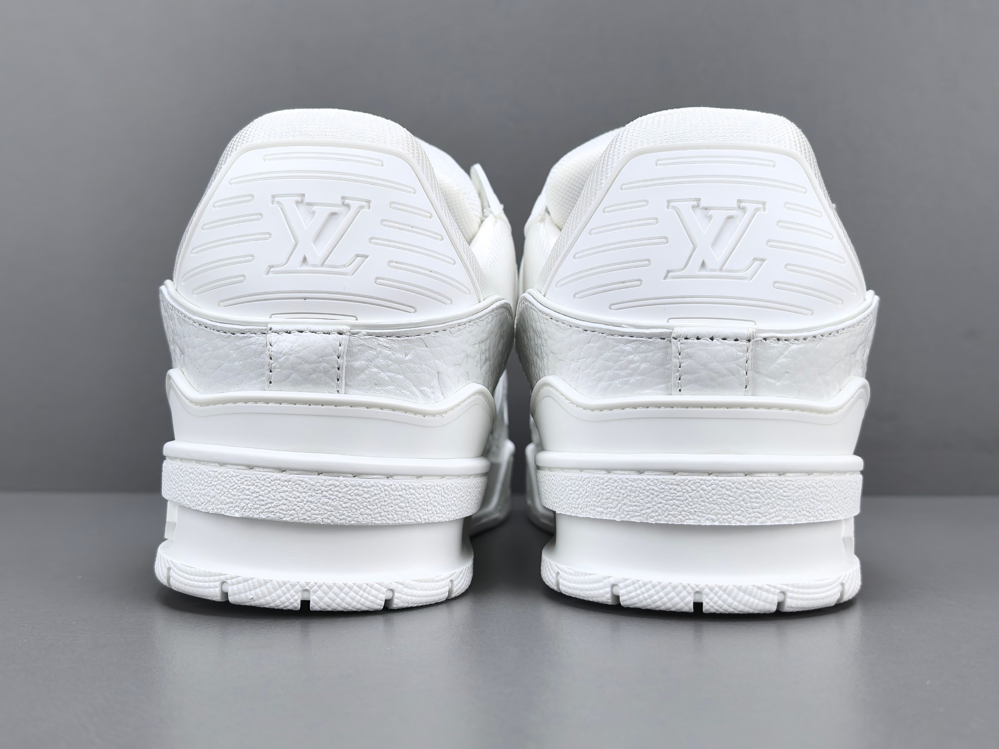 Louis Vuitton Trainer 2025 Edition Designed under the creative vision of Virgil Abloh, this LV Trainer draws inspiration from vintage basketball sneakers, blending heritage aesthetics with modern luxury. - Image 12