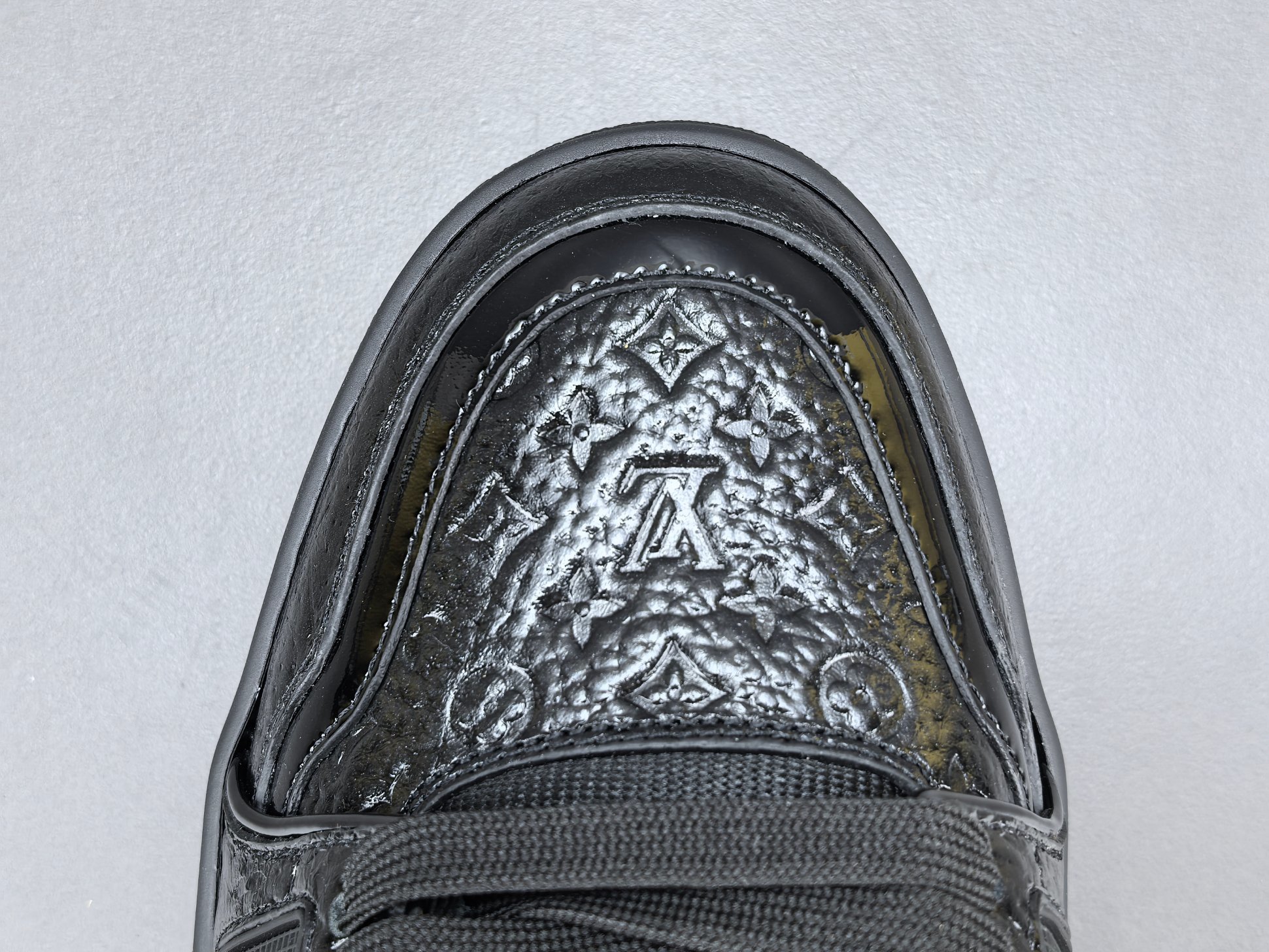 Louis Vuitton Trainer 2025 Edition Designed under the creative vision of Virgil Abloh, this LV Trainer draws inspiration from vintage basketball sneakers, blending heritage aesthetics with modern luxury. - Image 2