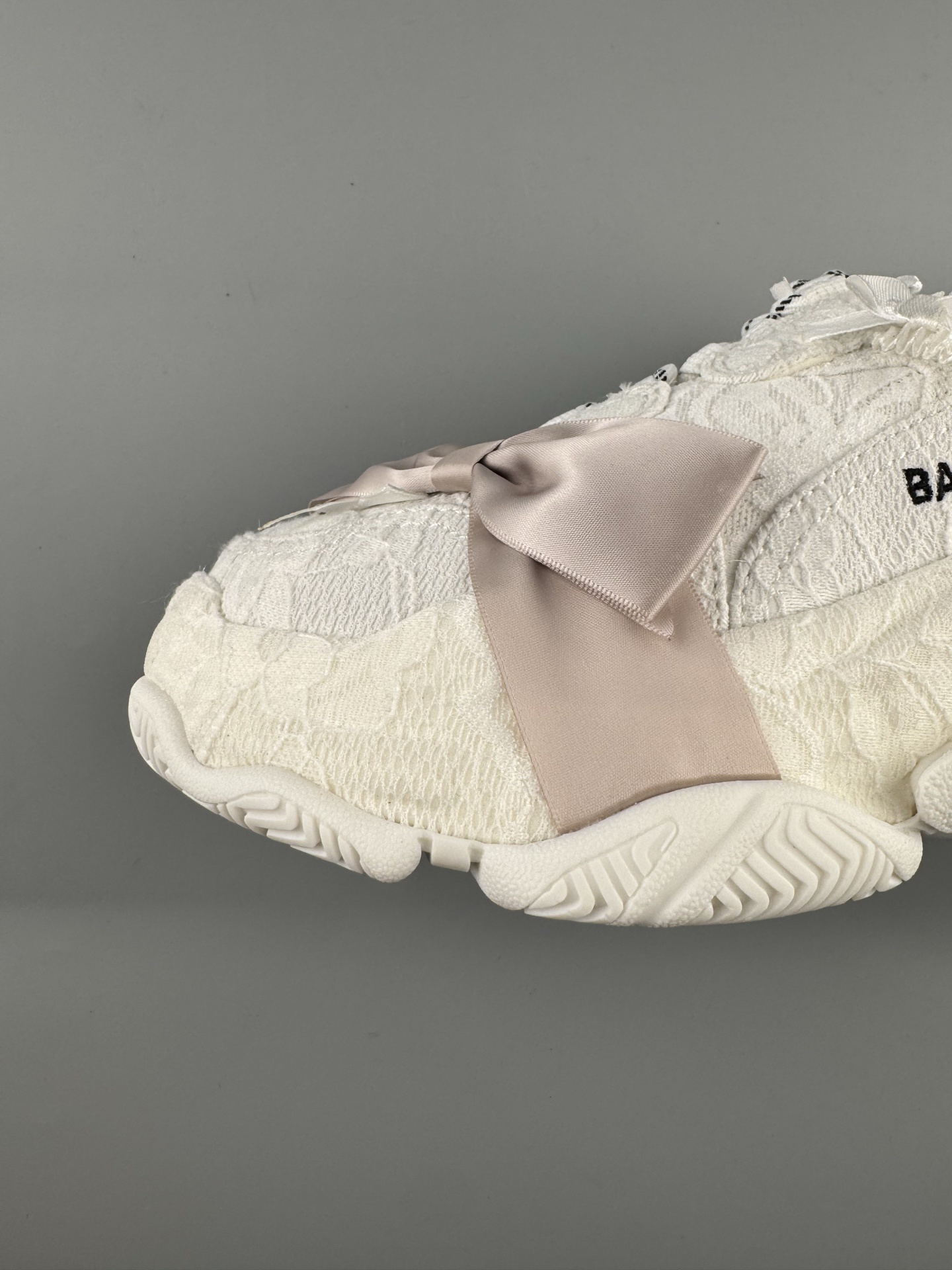 Balenciaga Triple S Round-Toe Lace-Up Sneakers with Satin Bow Detail. Women’s Low-Top “Dad Shoe” in White - Image 2
