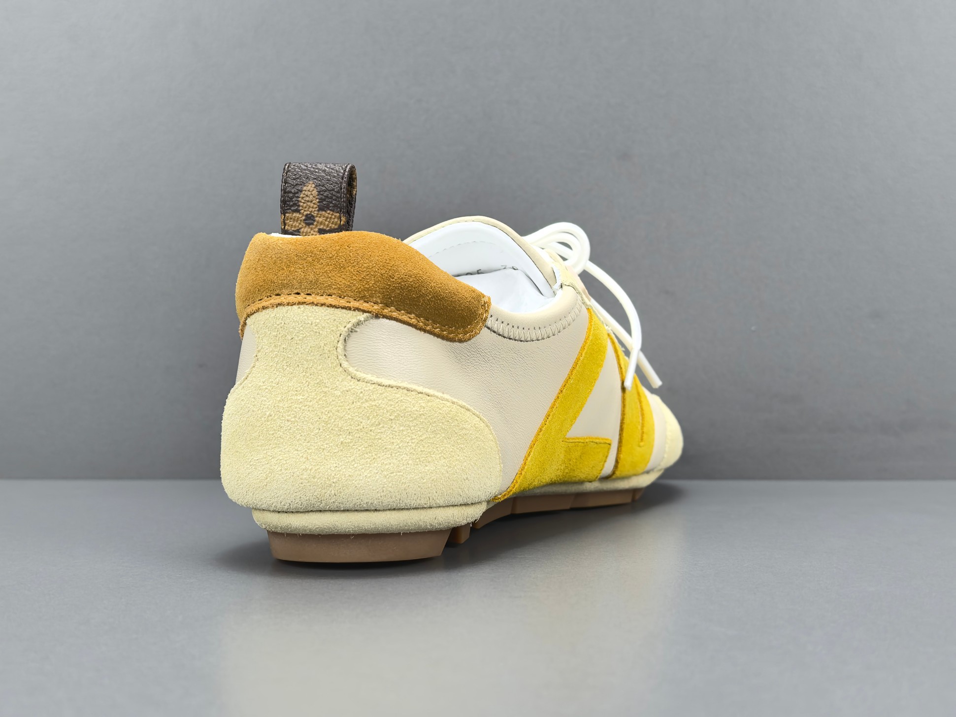 Louis Vuitton Sneakerina German trainer–style sneakers made of cowhide leather, featuring a round toe with lace-up closure, ballet-inspired design, thin sole, and low-top silhouette. Designed as women’s lifestyle casual shoes. - Image 2