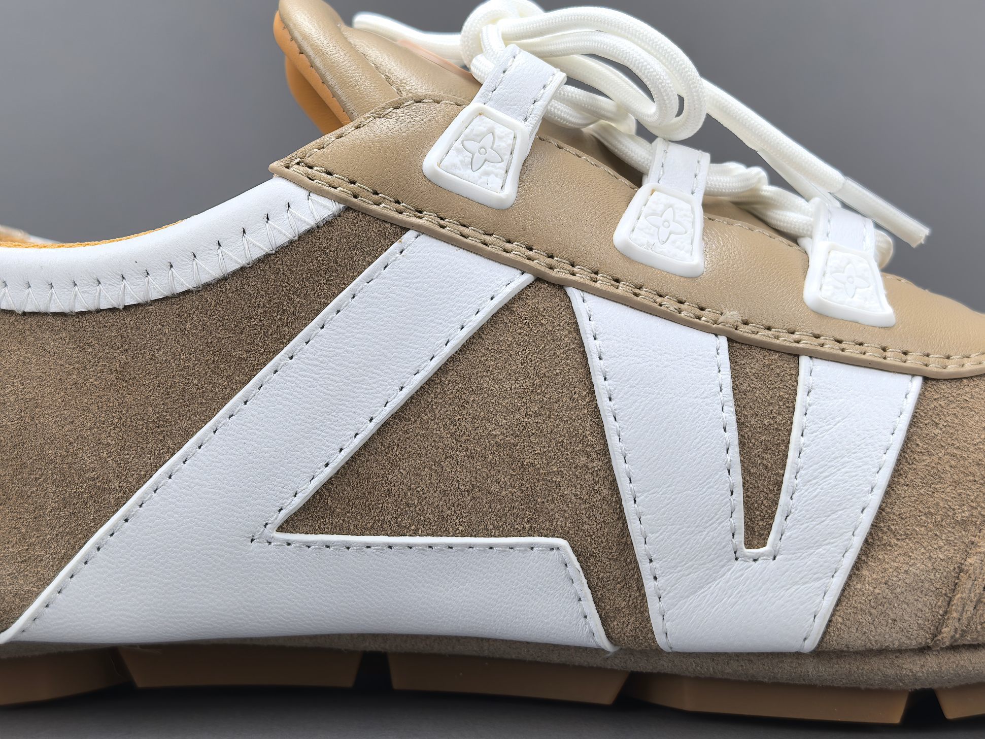Louis Vuitton Sneakerina German trainer–style women’s shoes made from cowhide leather, featuring a round toe, lace-up closure, ballet-inspired design, thin sole, and low-top silhouette. Designed for everyday lifestyle and casual wear. - Image 9