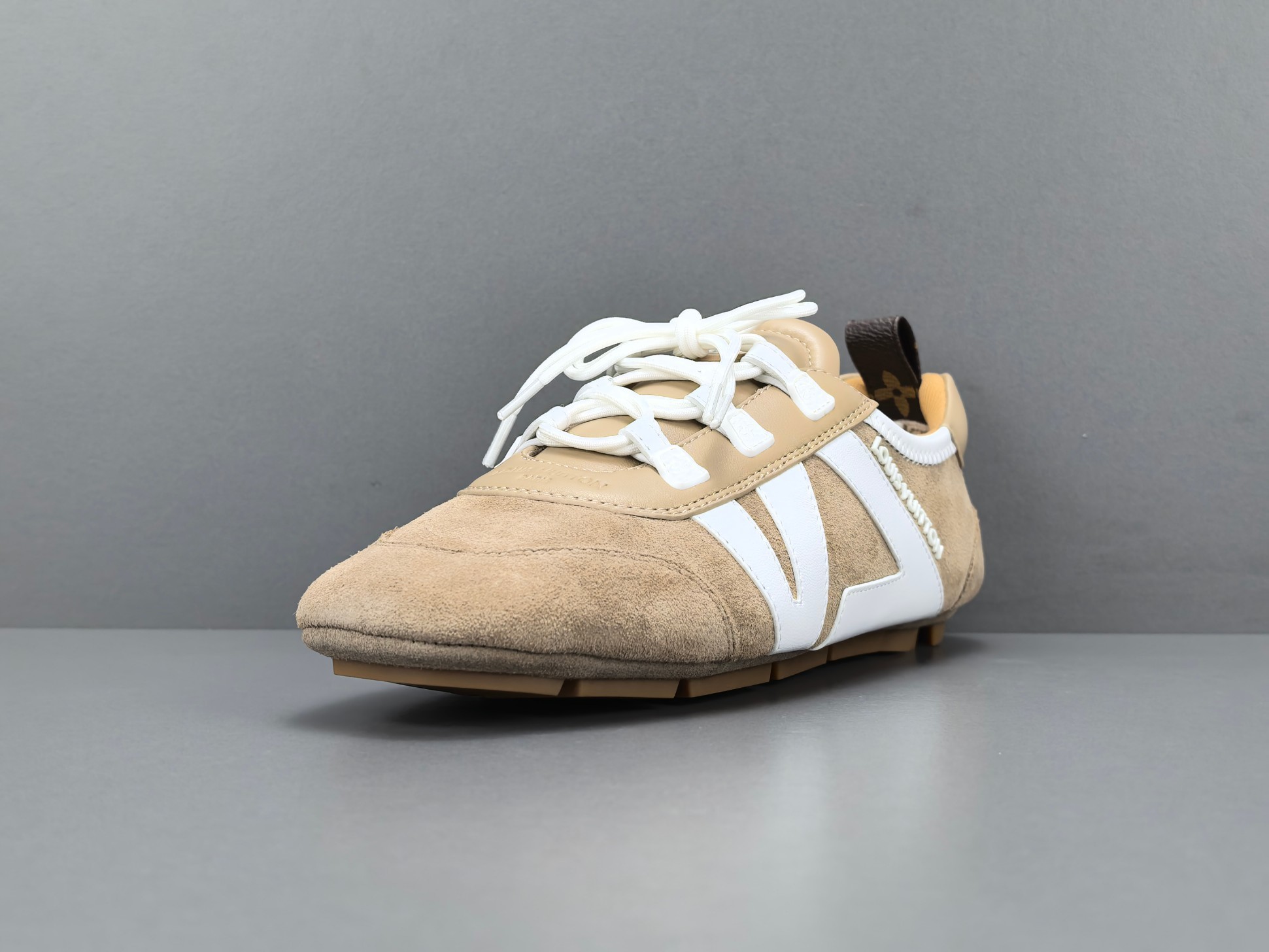 Louis Vuitton Sneakerina German trainer–style women’s shoes made from cowhide leather, featuring a round toe, lace-up closure, ballet-inspired design, thin sole, and low-top silhouette. Designed for everyday lifestyle and casual wear. - Image 10