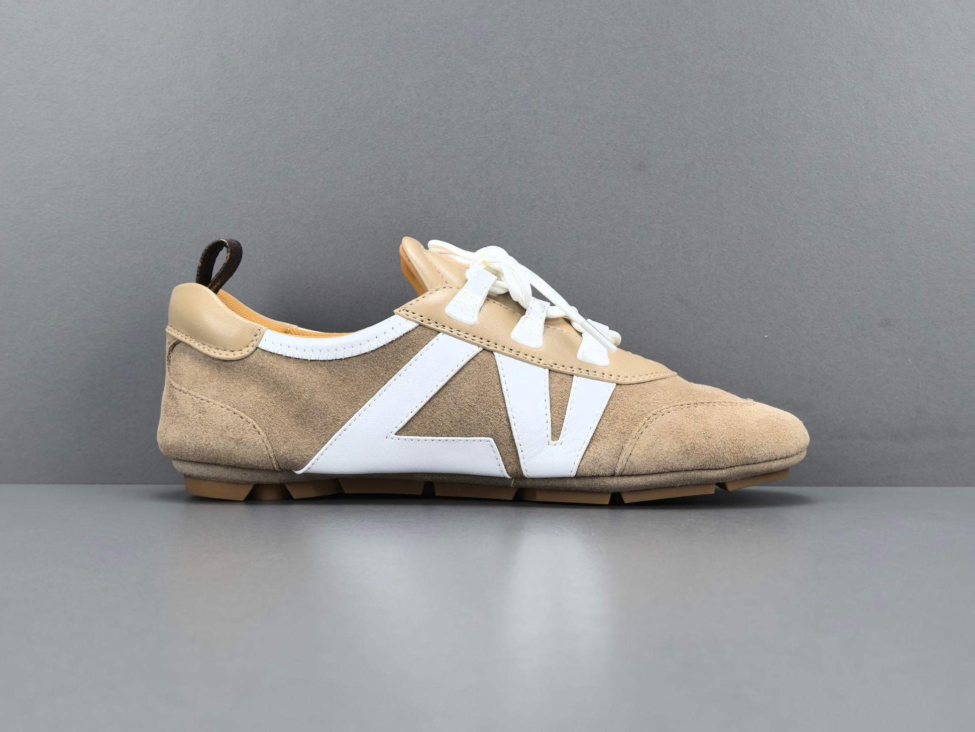 Louis Vuitton Sneakerina German trainer–style women’s shoes made from cowhide leather, featuring a round toe, lace-up closure, ballet-inspired design, thin sole, and low-top silhouette. Designed for everyday lifestyle and casual wear.