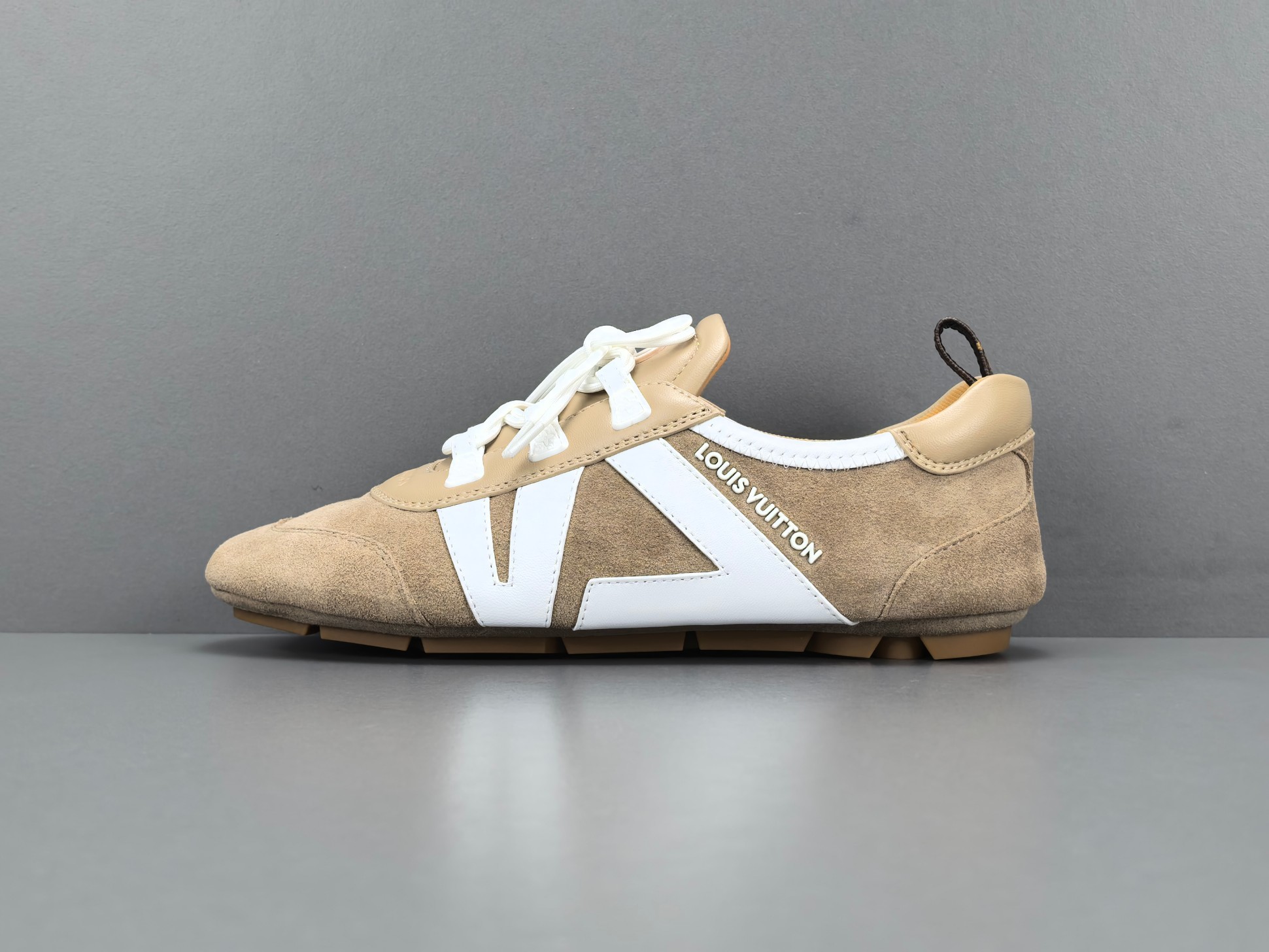 Louis Vuitton Sneakerina German trainer–style women’s shoes made from cowhide leather, featuring a round toe, lace-up closure, ballet-inspired design, thin sole, and low-top silhouette. Designed for everyday lifestyle and casual wear. - Image 14