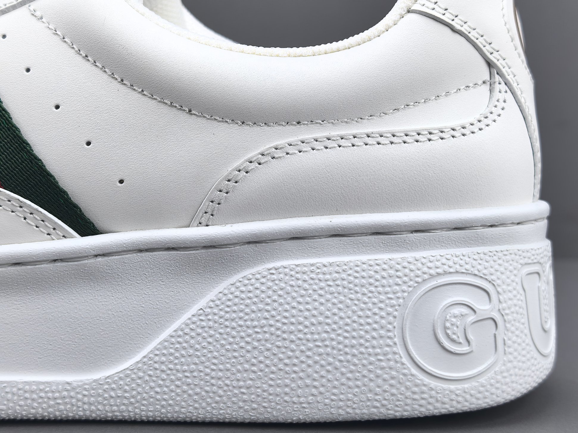 Gucci Chunky “Biscuit” Sneakers Low-top sneakers crafted from calf leather, featuring a round toe and lace-up closure. Sizes: 35, 36, 37, 38, 39, 40, 41, 42, 43, 44, 45 (Unisex). - Image 8