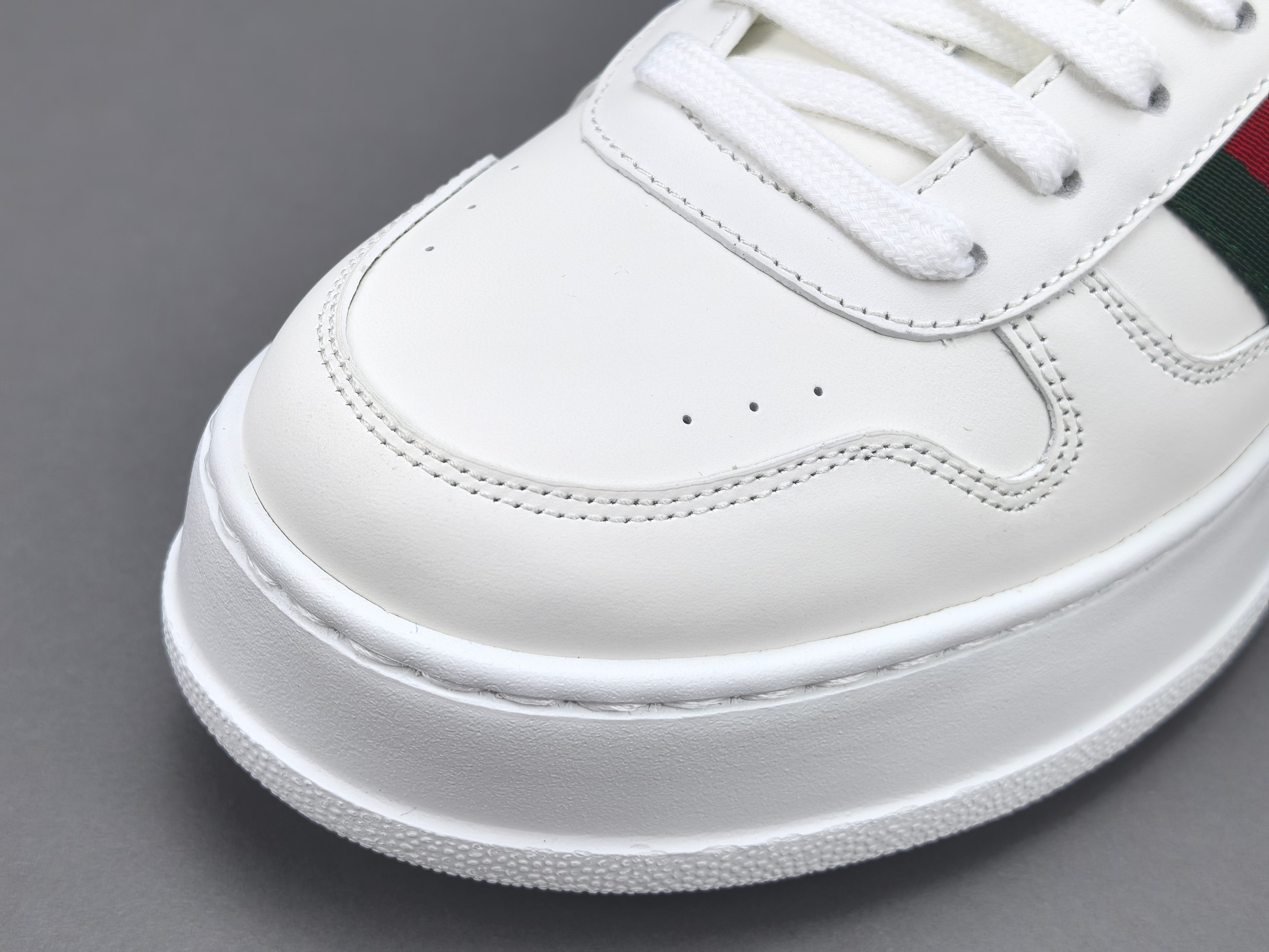 Gucci Chunky “Biscuit” Sneakers Low-top sneakers crafted from calf leather, featuring a round toe and lace-up closure. Sizes: 35, 36, 37, 38, 39, 40, 41, 42, 43, 44, 45 (Unisex). - Image 9