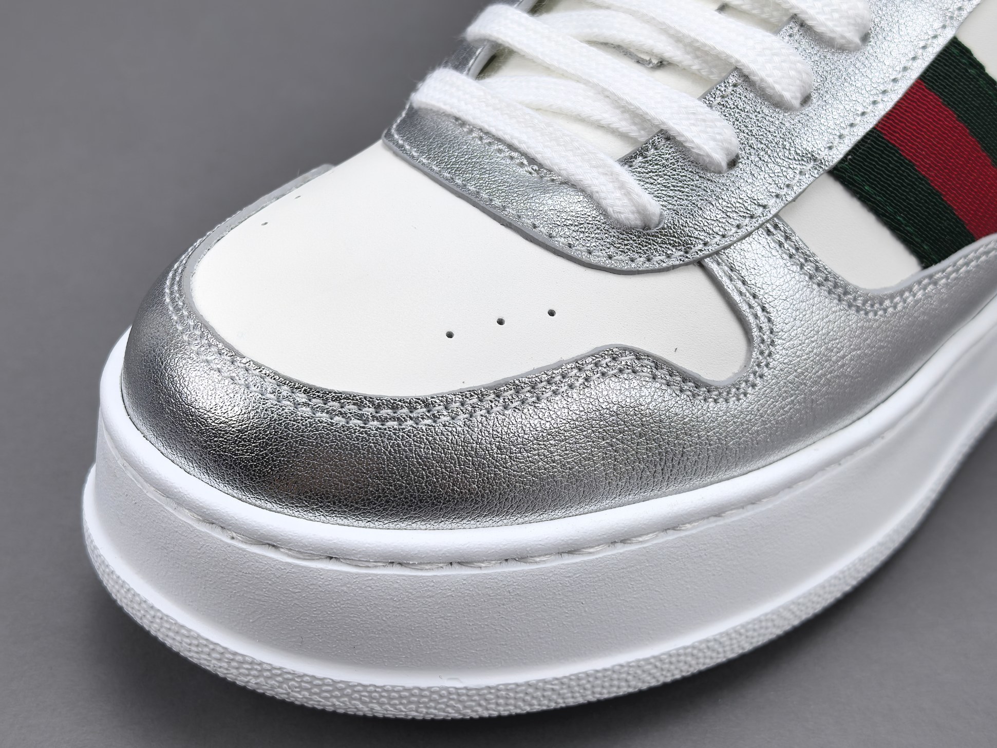 Gucci Chunky “Biscuit” Sneakers Low-top sneakers crafted from calf leather, featuring a round toe and lace-up closure. Sizes: 35, 36, 37, 38, 39, 40, 41, 42, 43, 44, 45 (Unisex). - Image 6