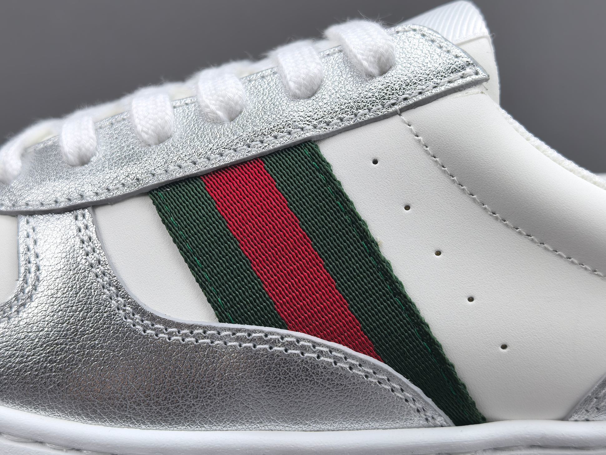 Gucci Chunky “Biscuit” Sneakers Low-top sneakers crafted from calf leather, featuring a round toe and lace-up closure. Sizes: 35, 36, 37, 38, 39, 40, 41, 42, 43, 44, 45 (Unisex). - Image 8