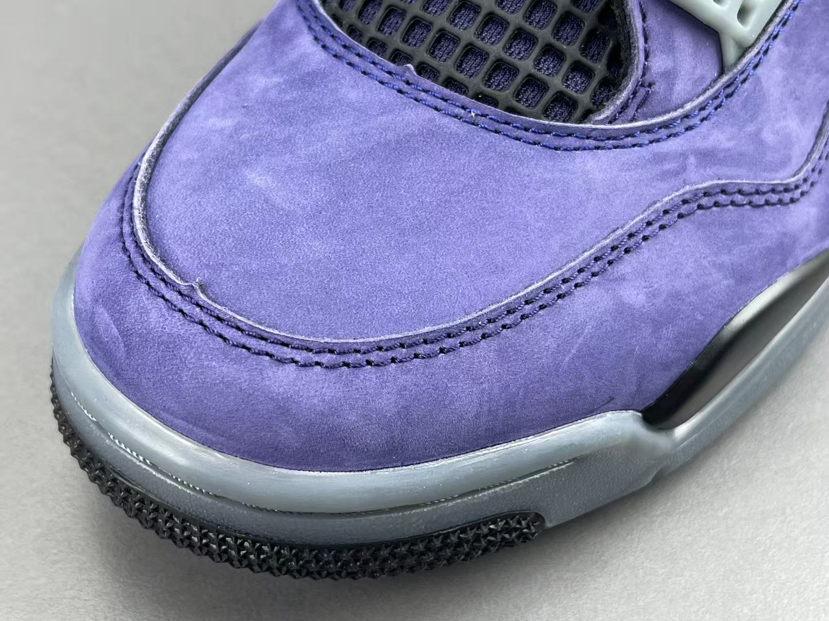Nike Air Jordan 4 Retro "Lakeshow" Mid-top retro basketball sneakers in purple, featuring comfortable, versatile wear and durable construction, inspired by the Lakers colorway. Suitable for men and women (unisex). - Image 3