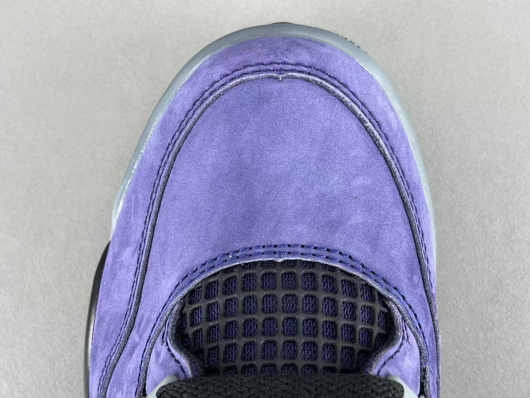 Nike Air Jordan 4 Retro "Lakeshow" Mid-top retro basketball sneakers in purple, featuring comfortable, versatile wear and durable construction, inspired by the Lakers colorway. Suitable for men and women (unisex). - Image 5
