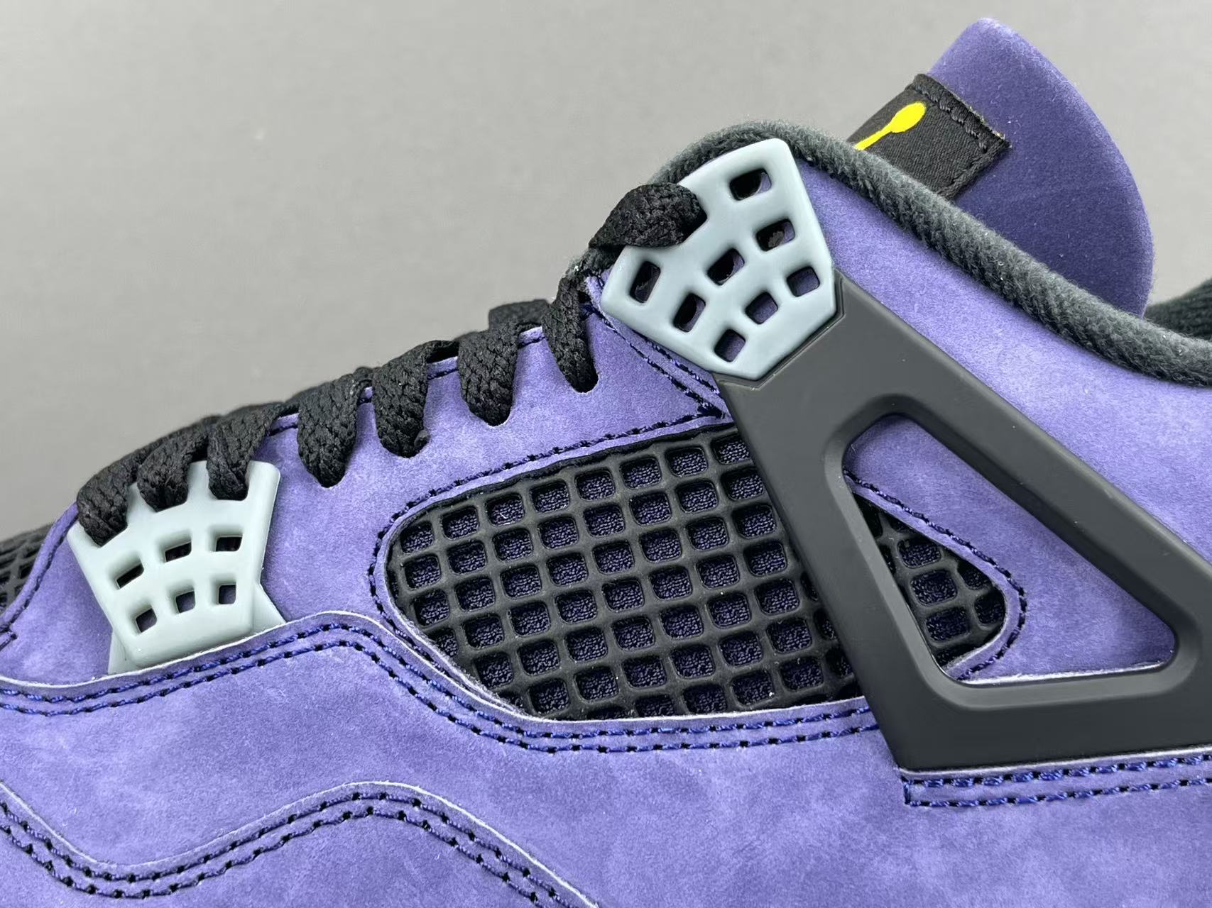 Nike Air Jordan 4 Retro "Lakeshow" Mid-top retro basketball sneakers in purple, featuring comfortable, versatile wear and durable construction, inspired by the Lakers colorway. Suitable for men and women (unisex). - Image 6