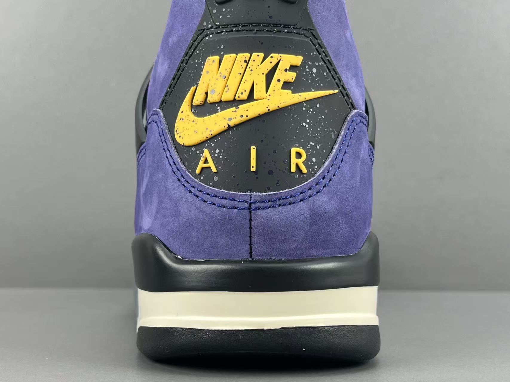 Nike Air Jordan 4 Retro "Lakeshow" Mid-top retro basketball sneakers in purple, featuring comfortable, versatile wear and durable construction, inspired by the Lakers colorway. Suitable for men and women (unisex). - Image 8