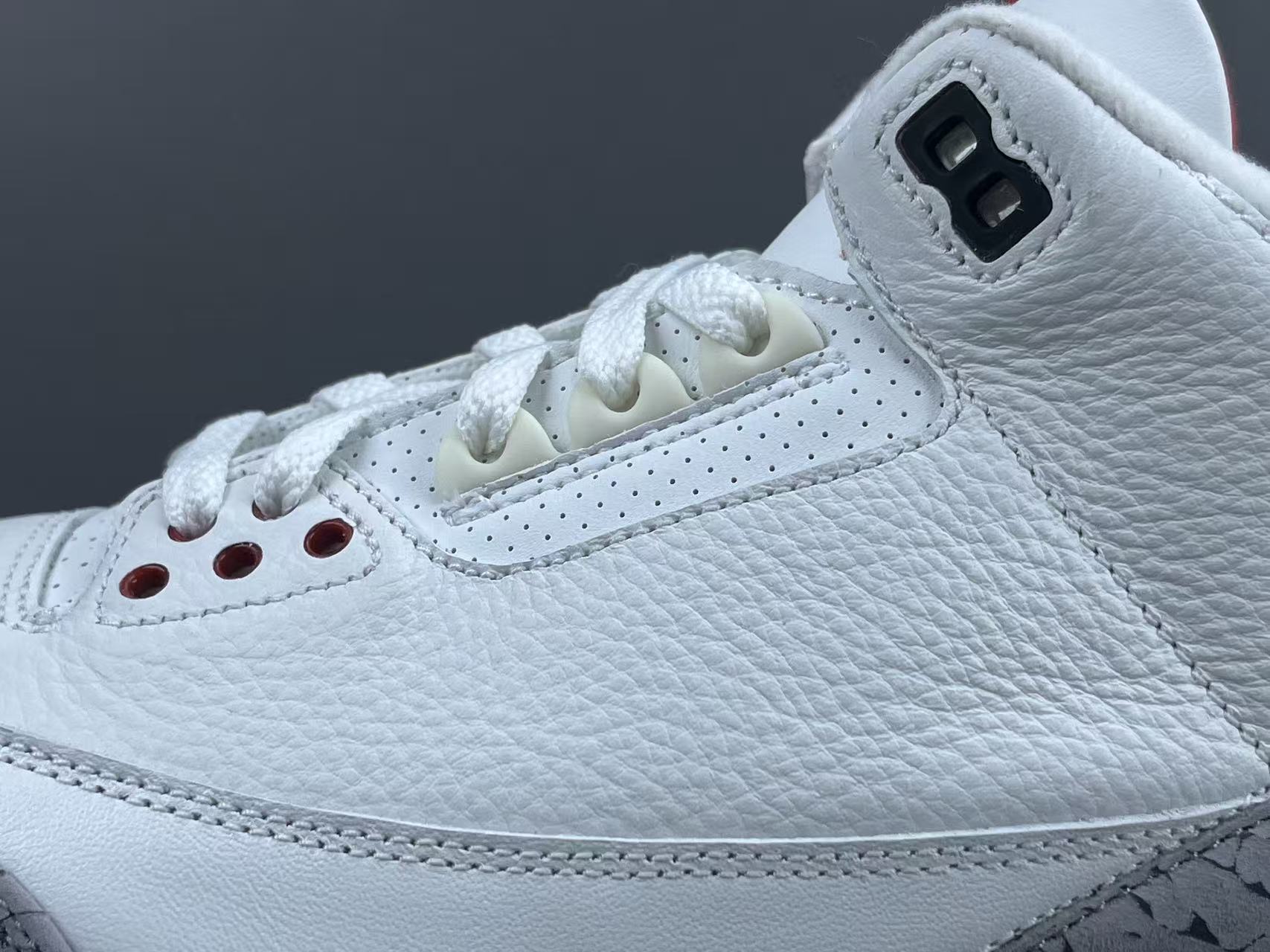 Nike Jordan Air Jordan 3 White Cement Reimagined Men’s mid-top retro basketball sneakers in white and grey, featuring leather construction, distressed “White Cement” styling, trendy design, precise detailing, cushioning, slip-resistant, and durable sole. 2023 Edition - Image 7