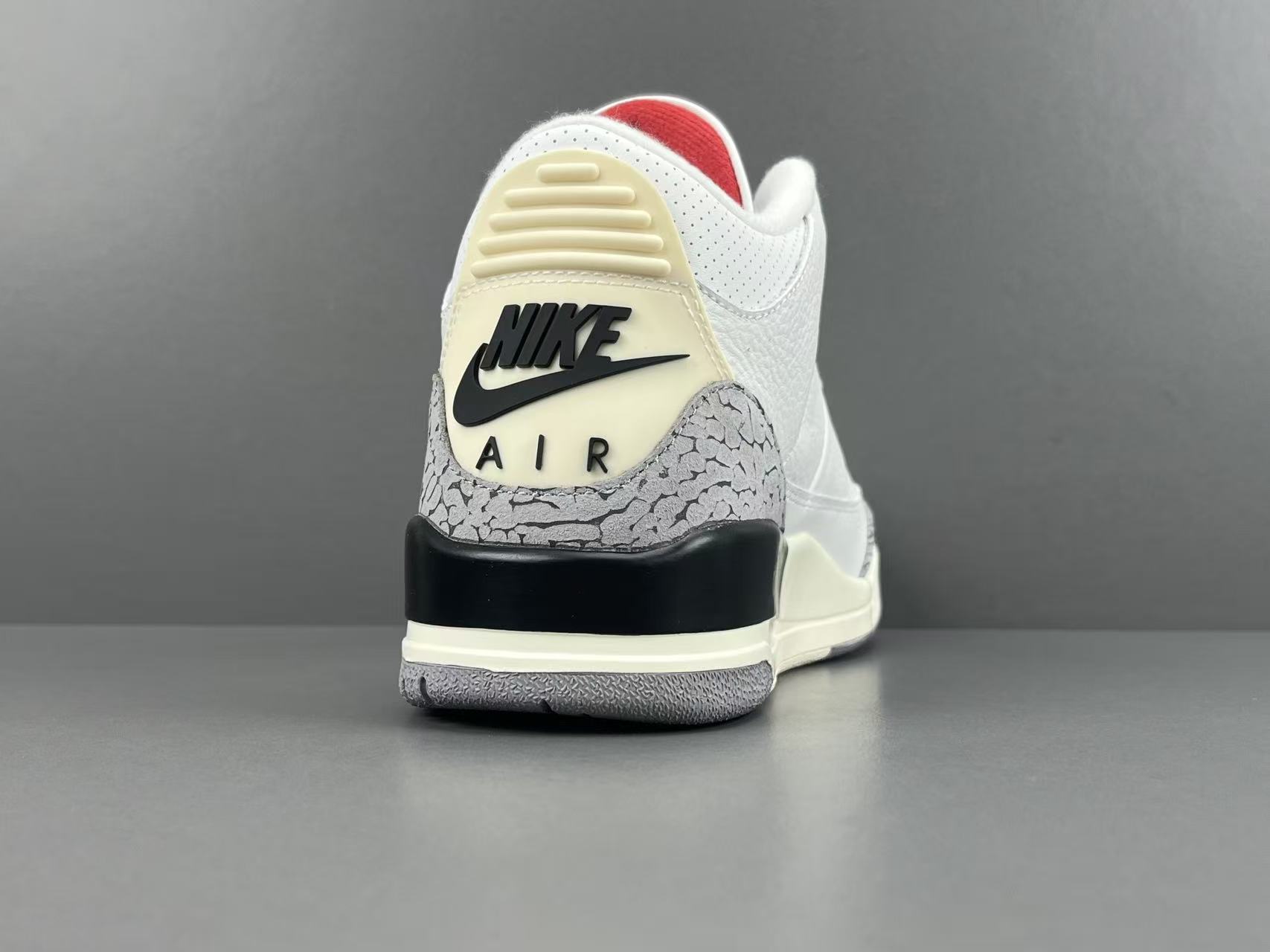 Nike Jordan Air Jordan 3 White Cement Reimagined Men’s mid-top retro basketball sneakers in white and grey, featuring leather construction, distressed “White Cement” styling, trendy design, precise detailing, cushioning, slip-resistant, and durable sole. 2023 Edition - Image 11