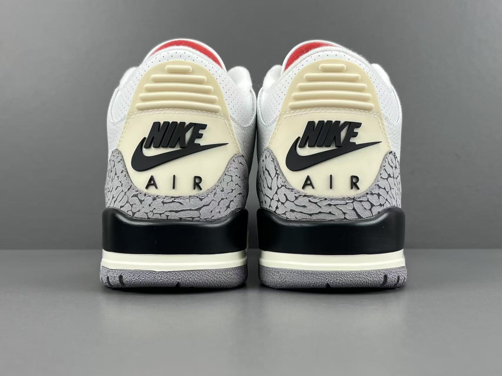 Nike Jordan Air Jordan 3 White Cement Reimagined Men’s mid-top retro basketball sneakers in white and grey, featuring leather construction, distressed “White Cement” styling, trendy design, precise detailing, cushioning, slip-resistant, and durable sole. 2023 Edition - Image 13