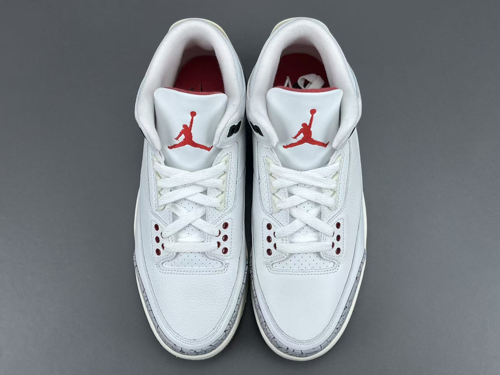 Nike Jordan Air Jordan 3 White Cement Reimagined Men’s mid-top retro basketball sneakers in white and grey, featuring leather construction, distressed “White Cement” styling, trendy design, precise detailing, cushioning, slip-resistant, and durable sole. 2023 Edition - Image 15