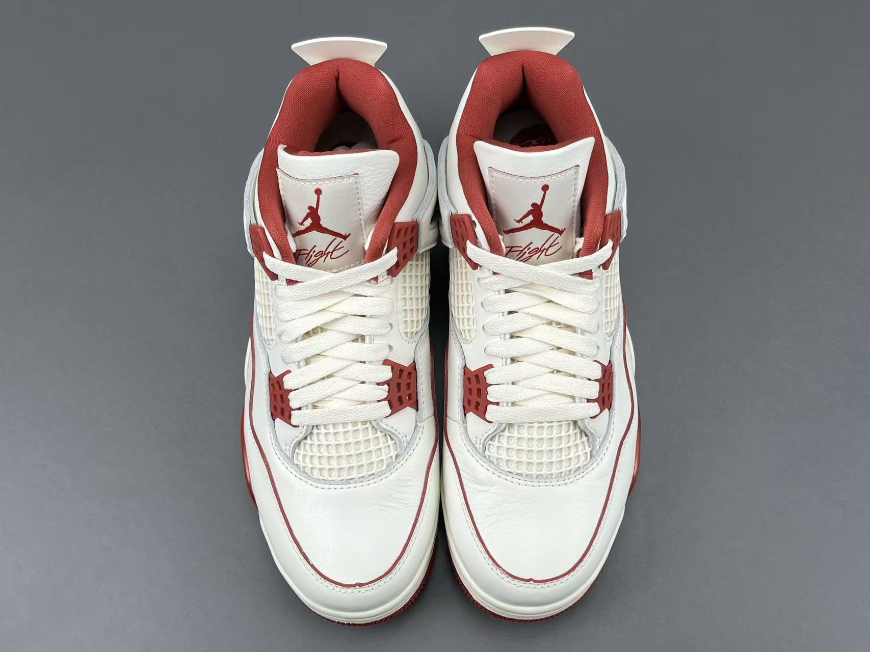 Nike Jordan Air Jordan 4 Retro “Sierra Red” Mid-top retro basketball sneakers in off-red, featuring comfortable, versatile wear and a slip-resistant, durable sole. Suitable for men and women (unisex). - Image 14