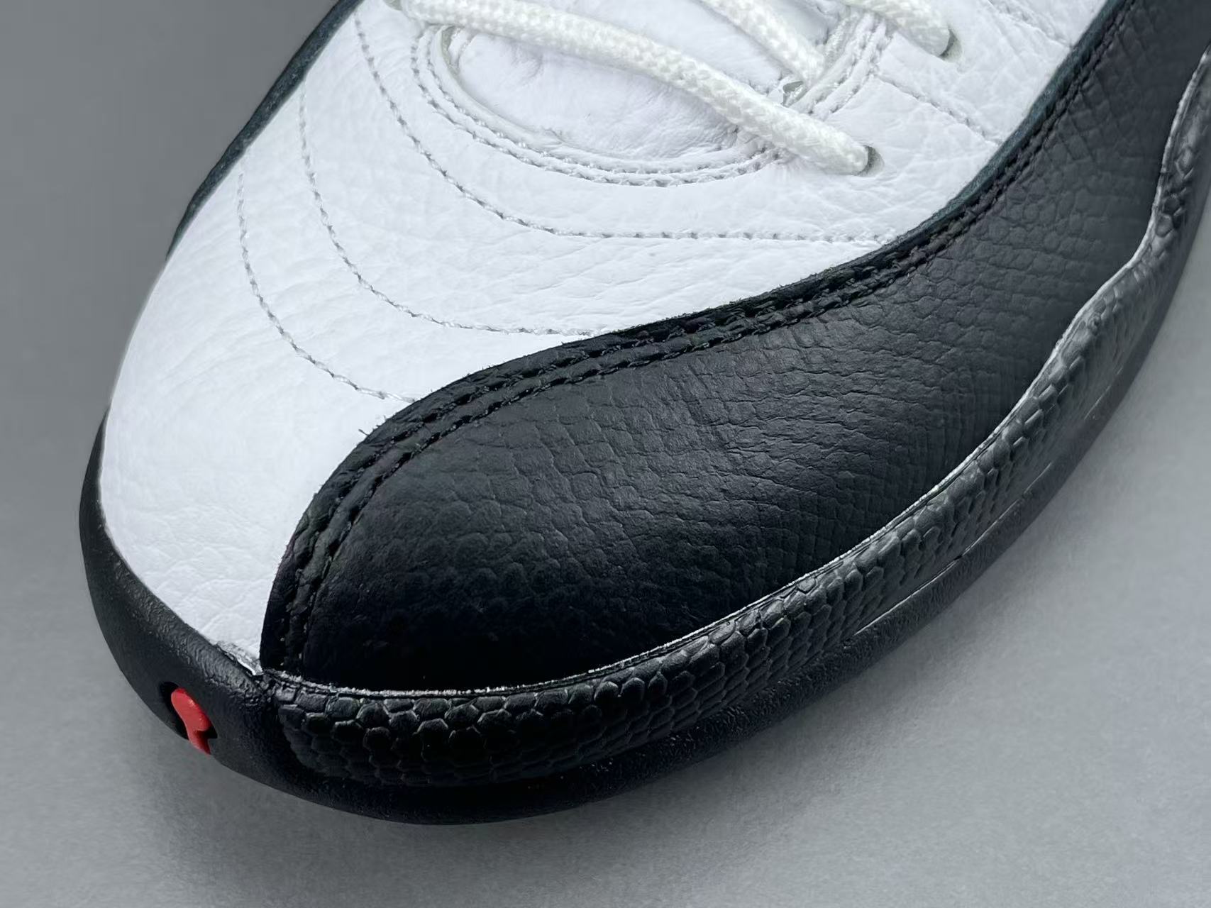 Nike Jordan Air Jordan 12 Retro “Taxi” Men’s high-top retro basketball sneakers in white and black, featuring comfortable cushioning and responsive rebound. - Image 2