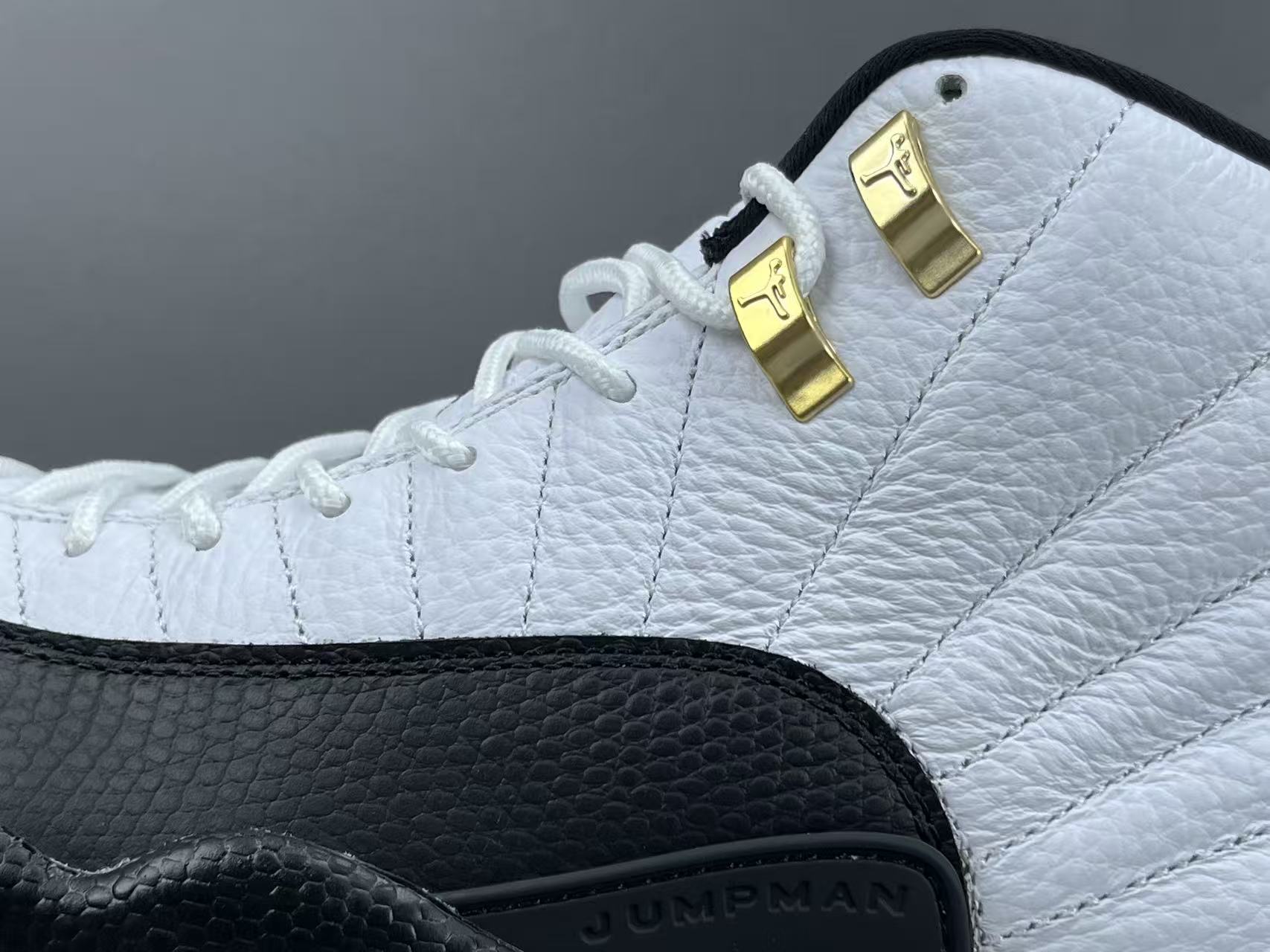 Nike Jordan Air Jordan 12 Retro “Taxi” Men’s high-top retro basketball sneakers in white and black, featuring comfortable cushioning and responsive rebound. - Image 5