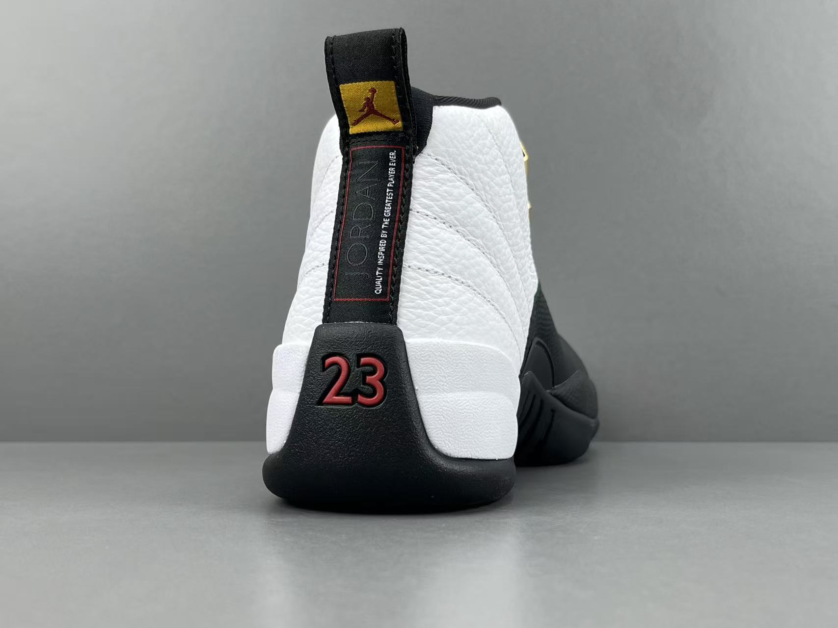 Nike Jordan Air Jordan 12 Retro “Taxi” Men’s high-top retro basketball sneakers in white and black, featuring comfortable cushioning and responsive rebound. - Image 11