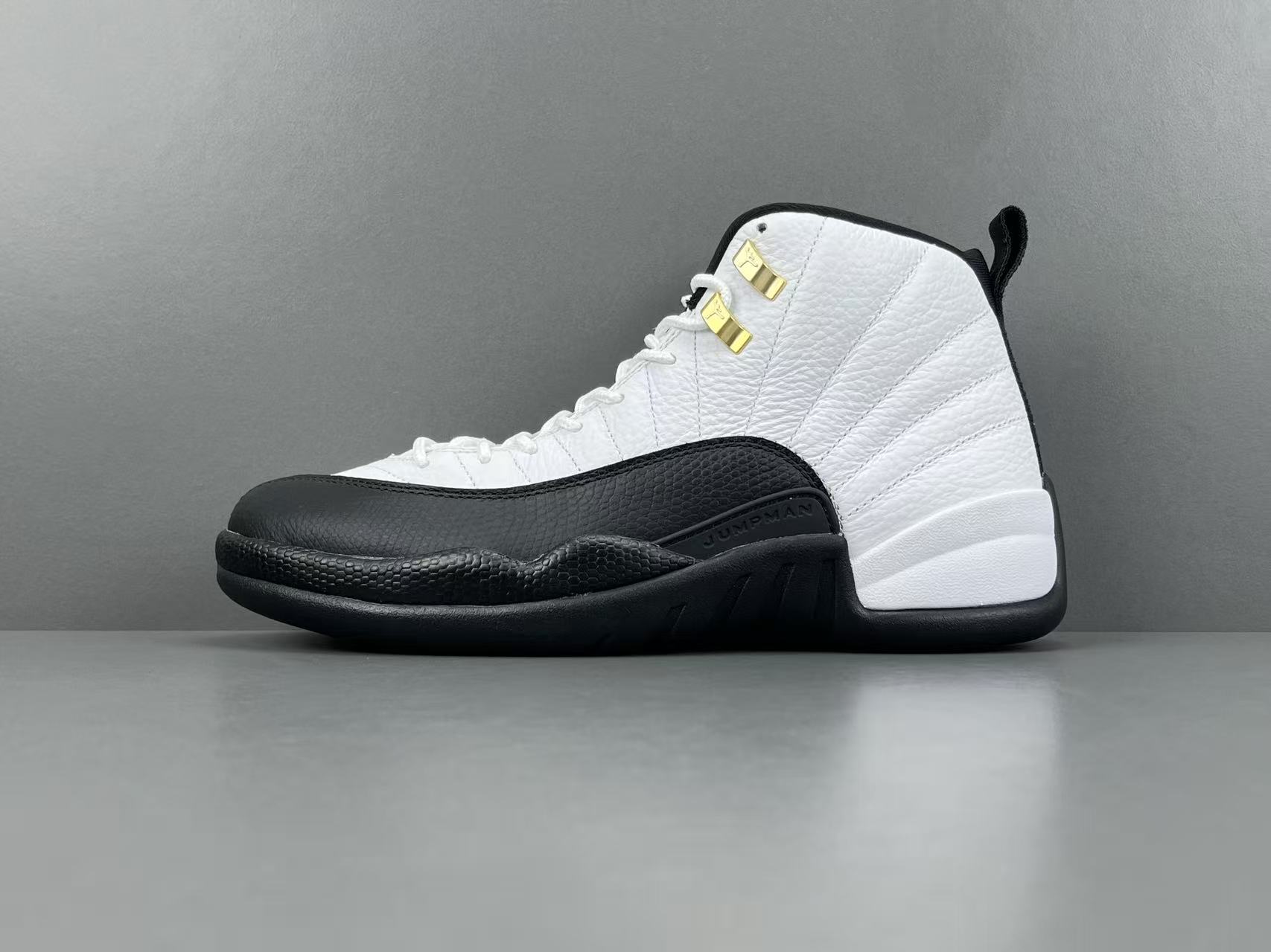 Nike Jordan Air Jordan 12 Retro “Taxi” Men’s high-top retro basketball sneakers in white and black, featuring comfortable cushioning and responsive rebound. - Image 12