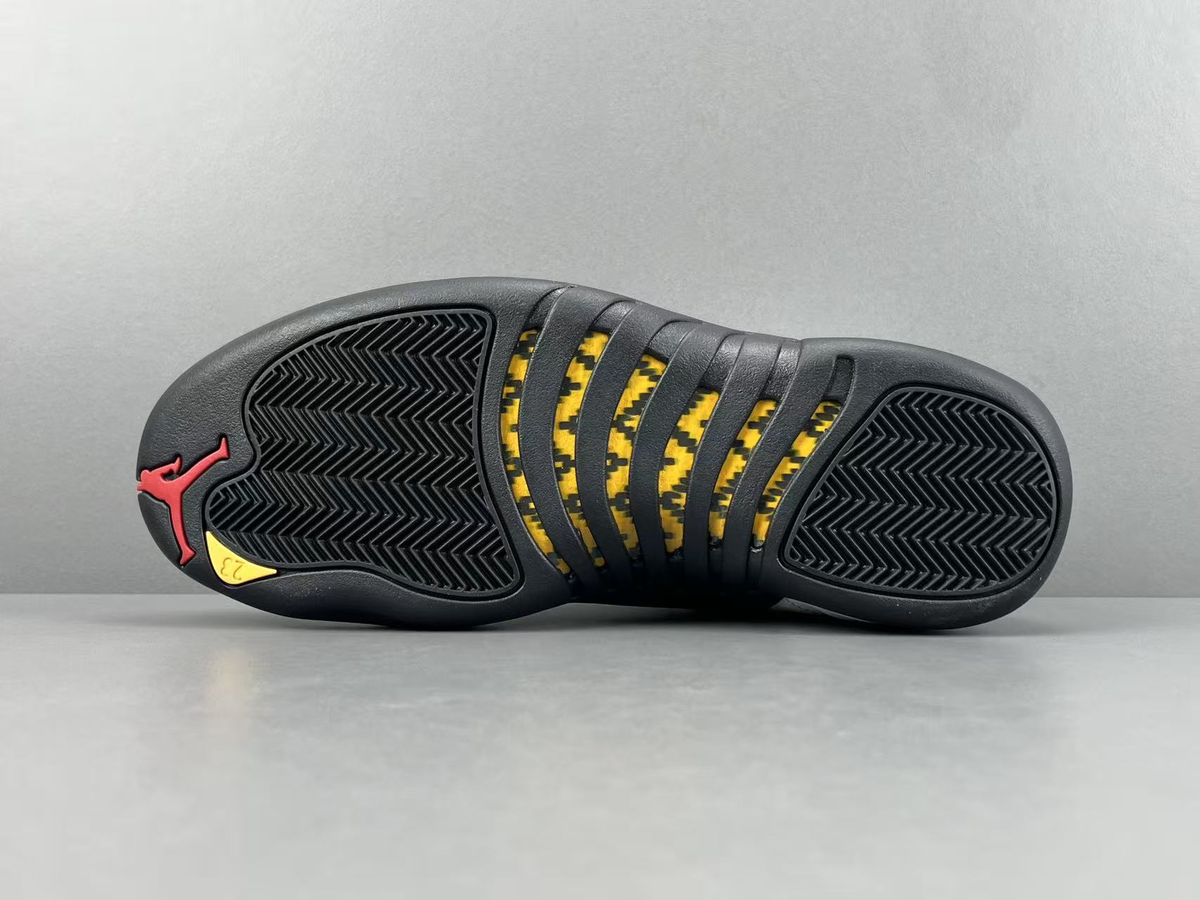 Nike Jordan Air Jordan 12 Retro “Taxi” Men’s high-top retro basketball sneakers in white and black, featuring comfortable cushioning and responsive rebound. - Image 13