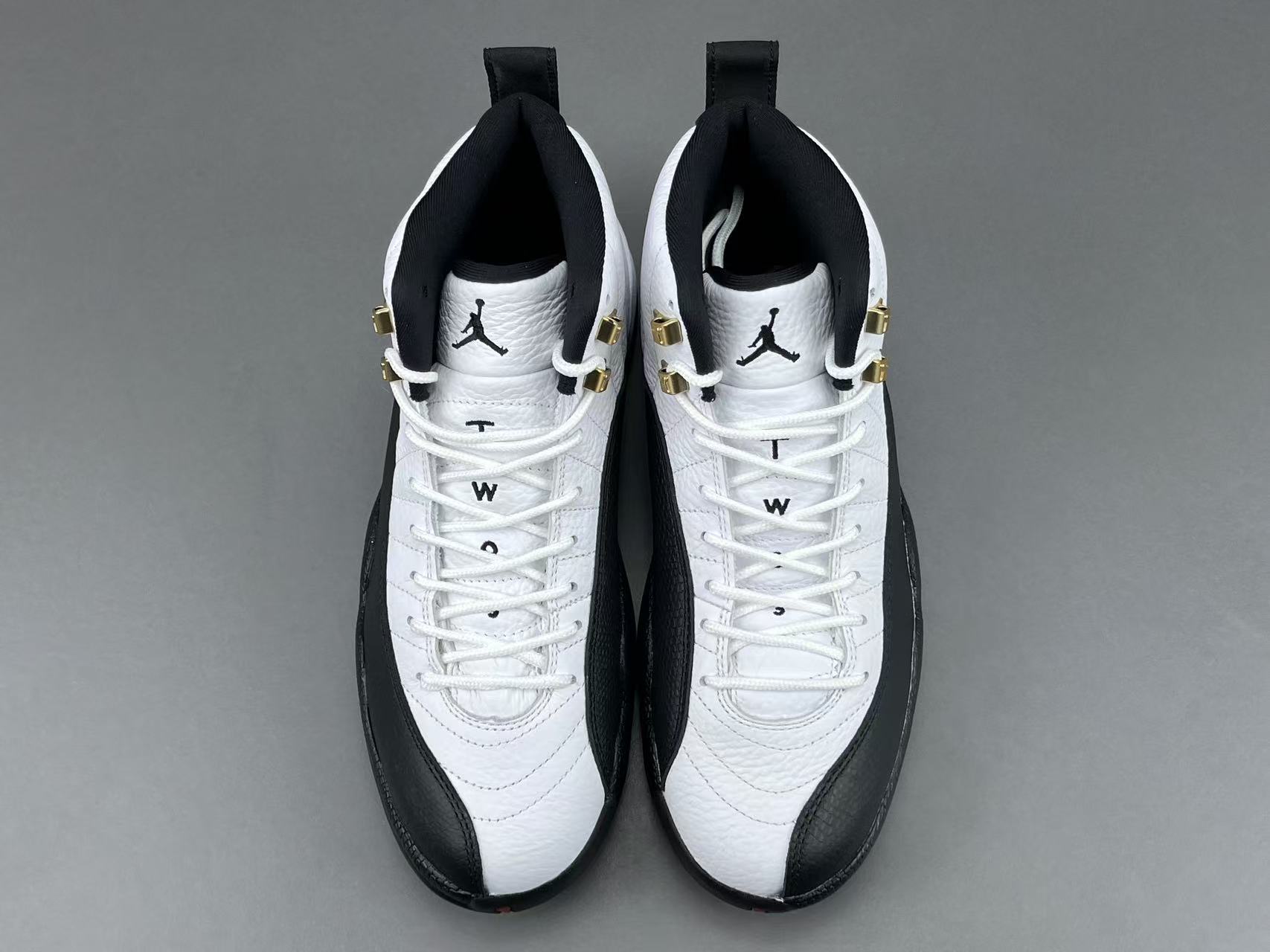 Nike Jordan Air Jordan 12 Retro “Taxi” Men’s high-top retro basketball sneakers in white and black, featuring comfortable cushioning and responsive rebound. - Image 14