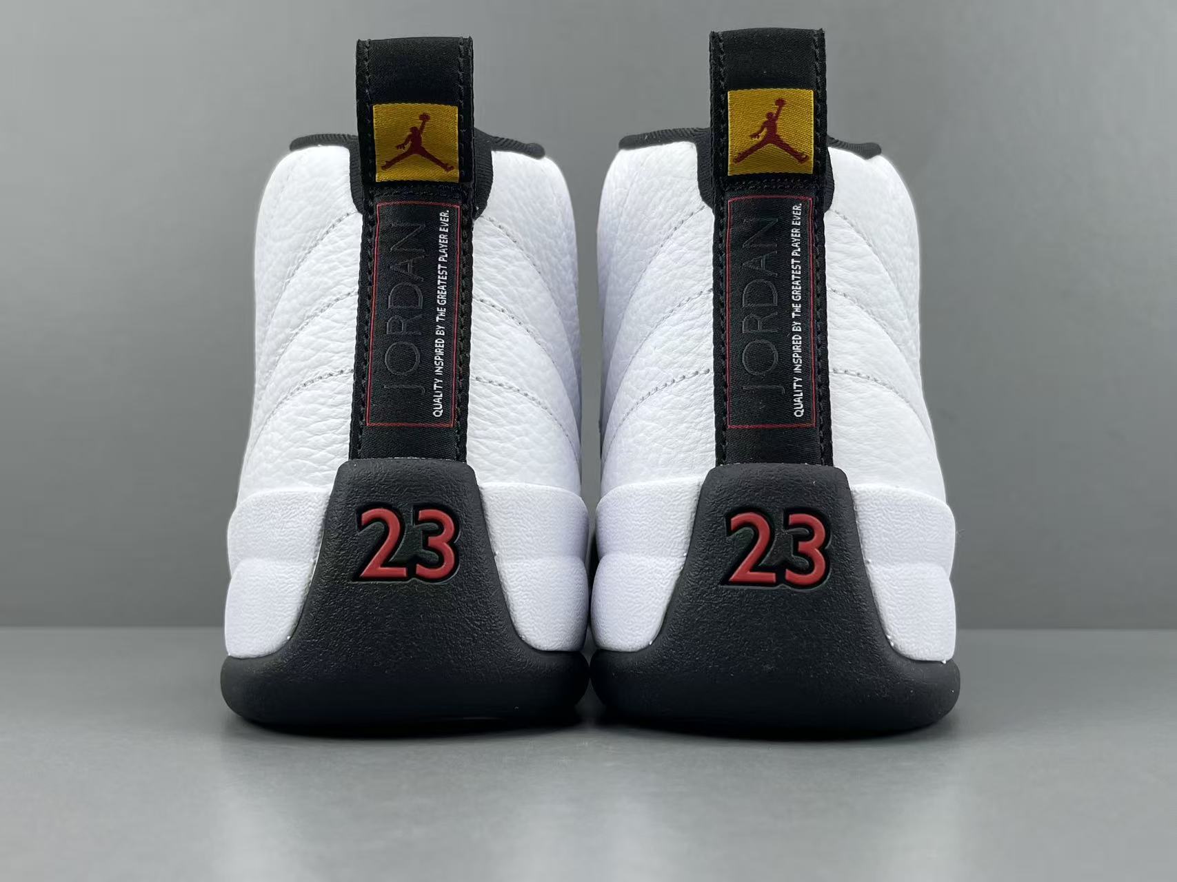 Nike Jordan Air Jordan 12 Retro “Taxi” Men’s high-top retro basketball sneakers in white and black, featuring comfortable cushioning and responsive rebound. - Image 15