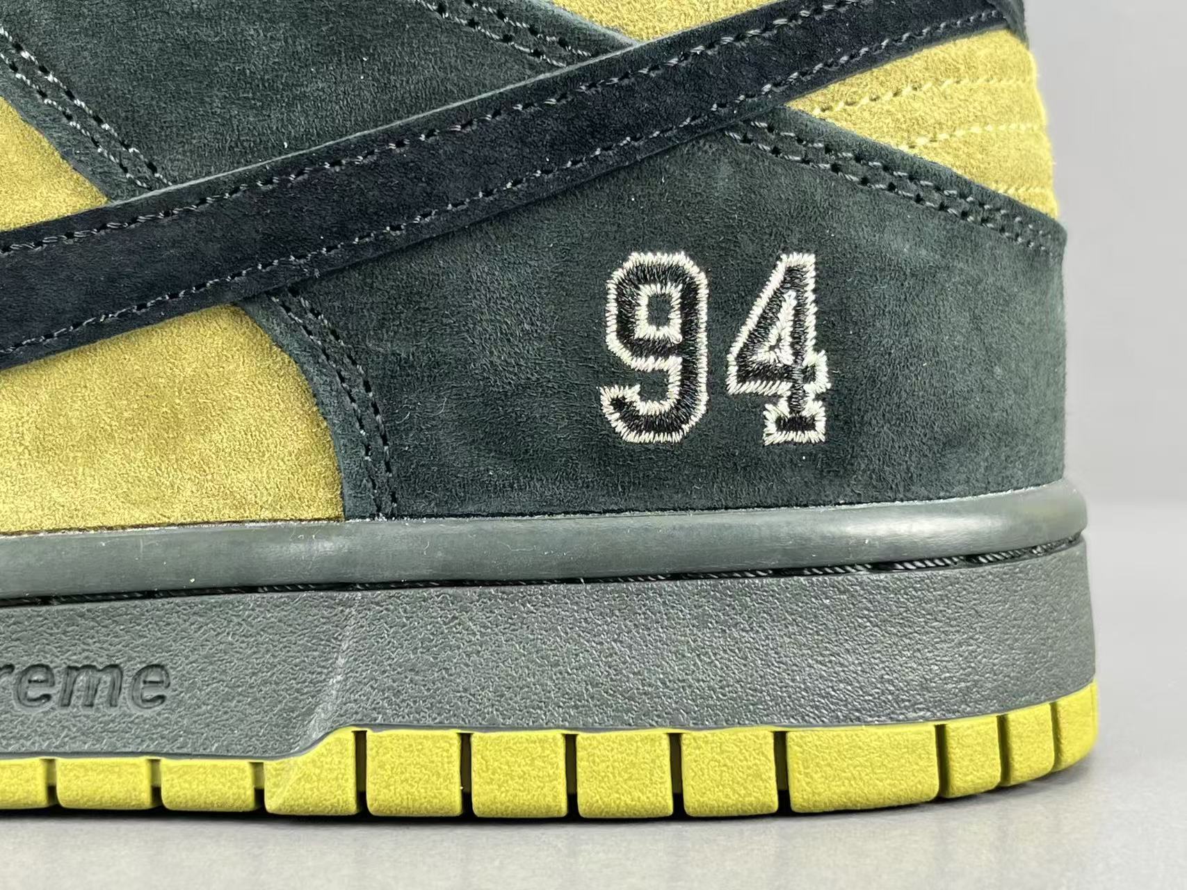 Nike x Supreme Dunk SB Low Low-top skate sneakers in yellow and black, featuring comfortable wear, Asia-exclusive edition, and slip-resistant, durable sole. Suitable for men and women (unisex). - Image 9