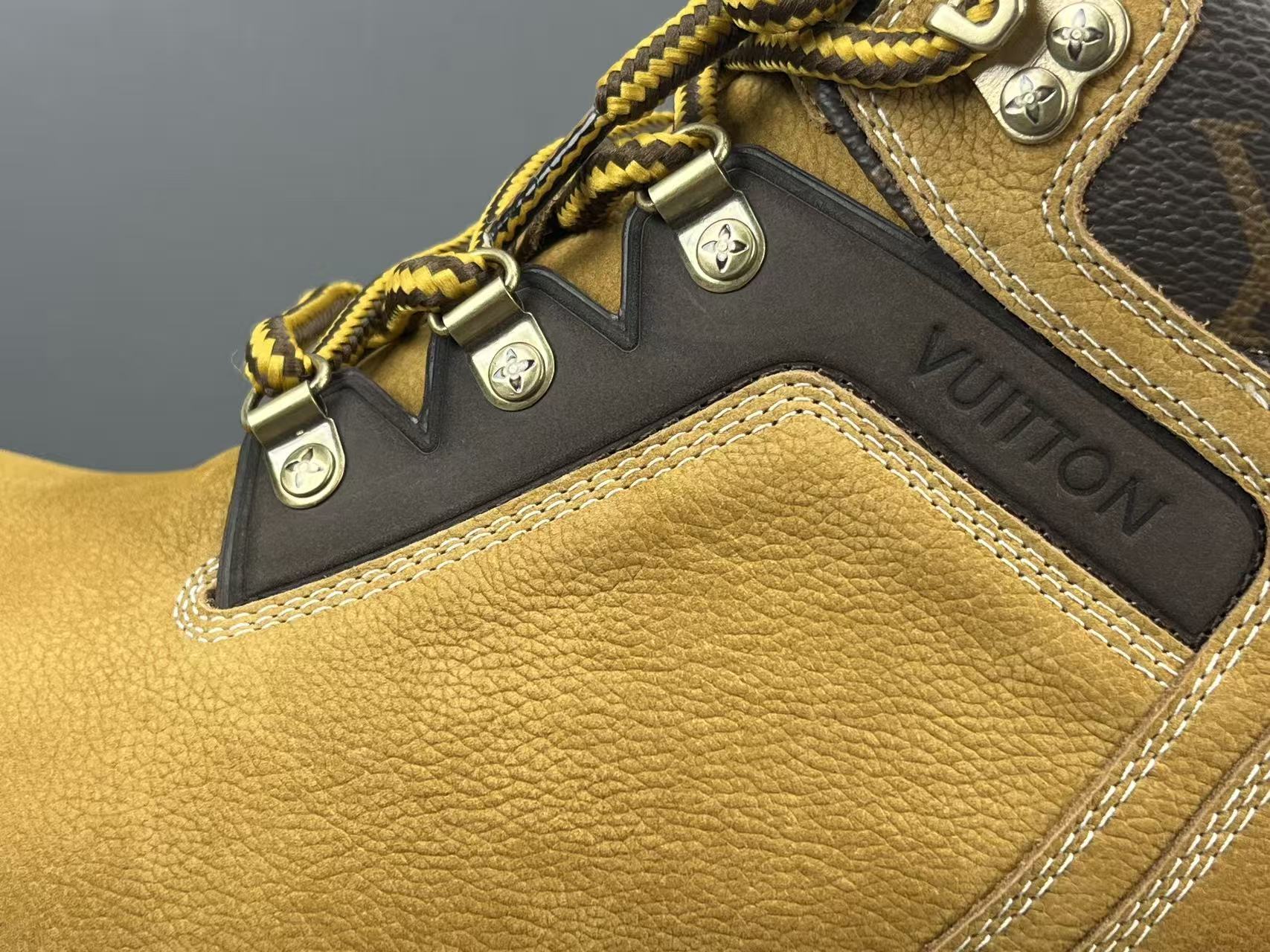 Louis Vuitton REMIX Men’s mid-top outdoor boots in brown, crafted from suede calf leather, featuring letter and floral lace-up design and ankle-high silhouette. - Image 6