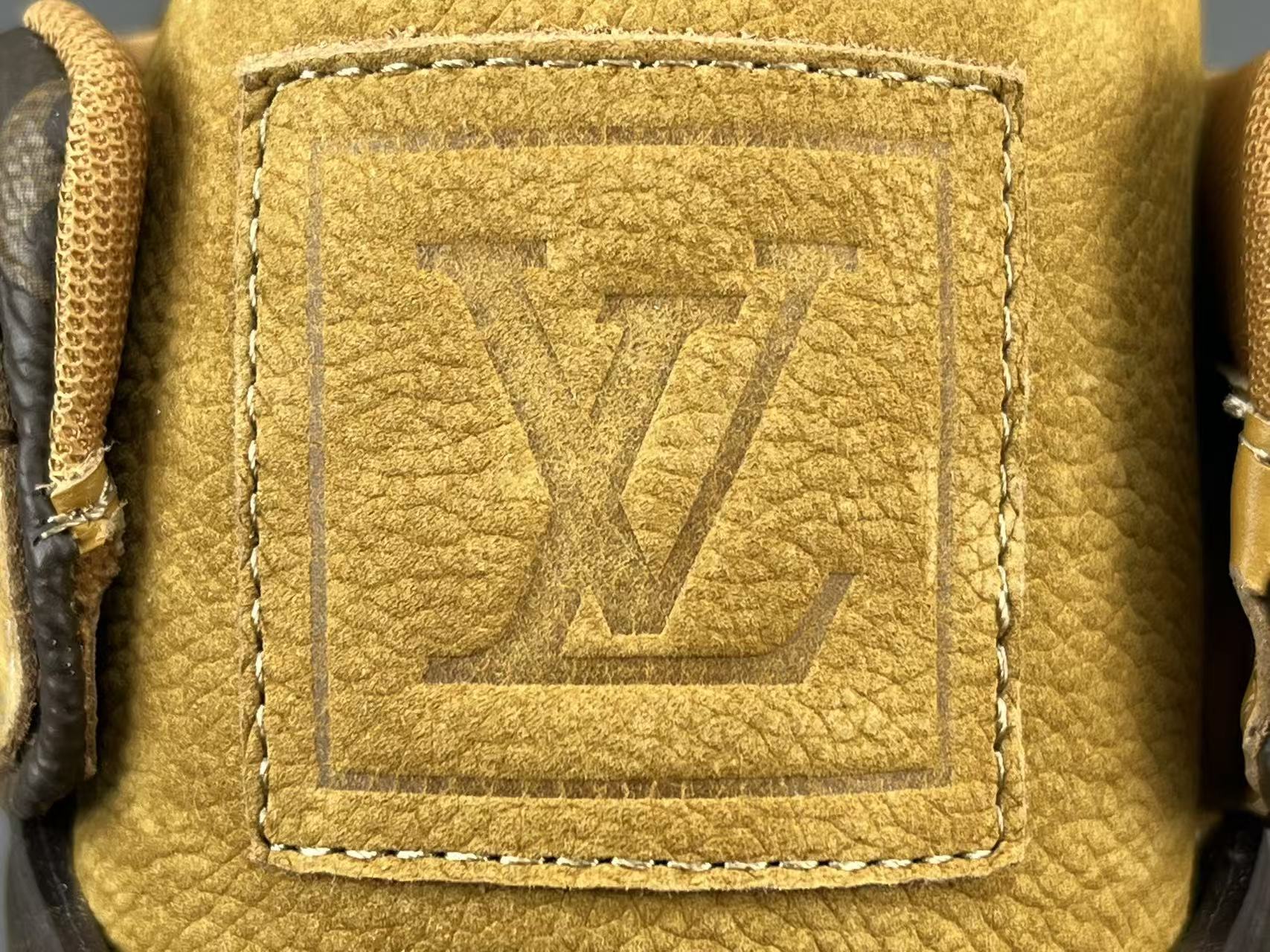 Louis Vuitton REMIX Men’s mid-top outdoor boots in brown, crafted from suede calf leather, featuring letter and floral lace-up design and ankle-high silhouette. - Image 9