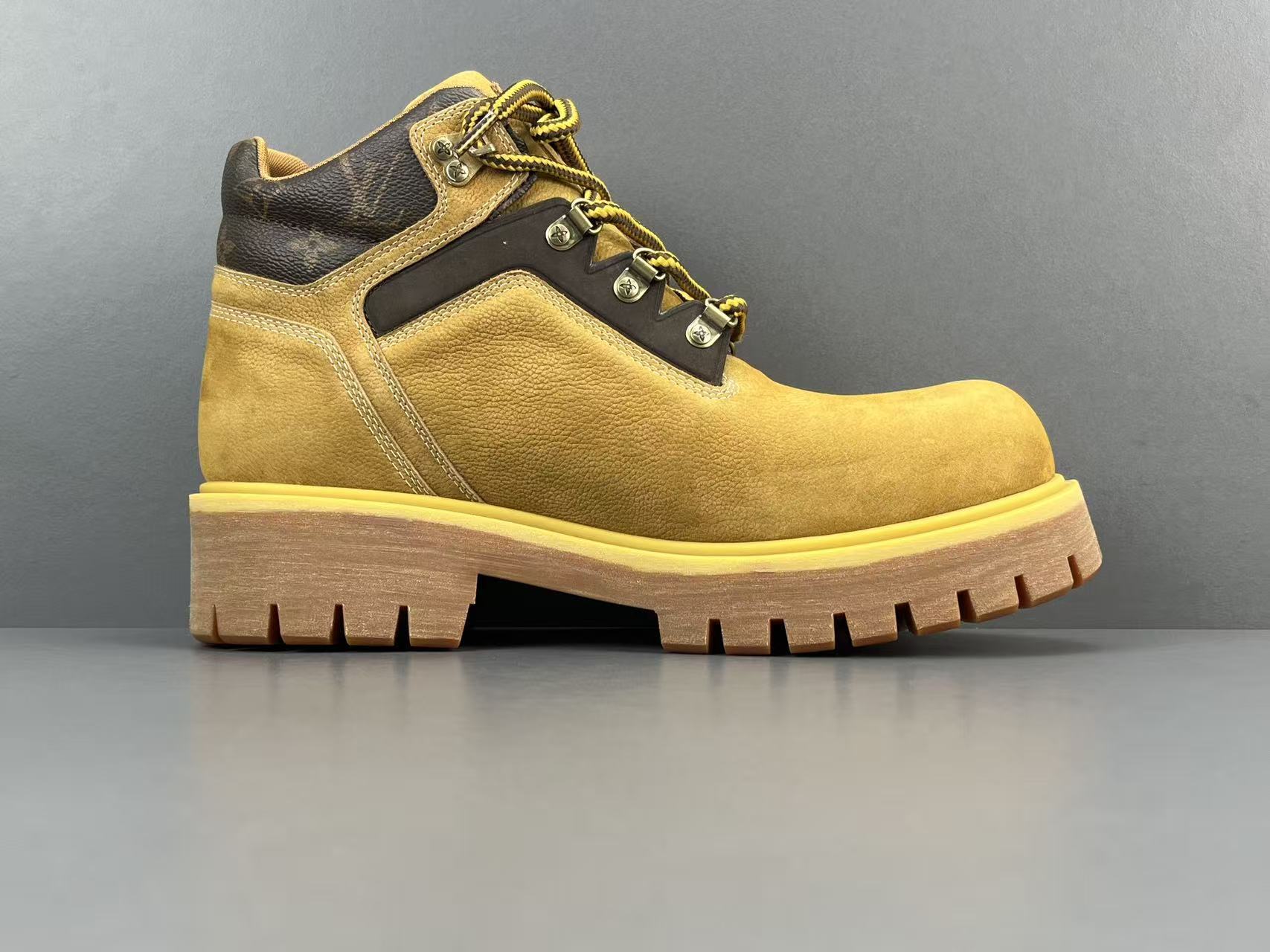 Louis Vuitton REMIX Men’s mid-top outdoor boots in brown, crafted from suede calf leather, featuring letter and floral lace-up design and ankle-high silhouette.