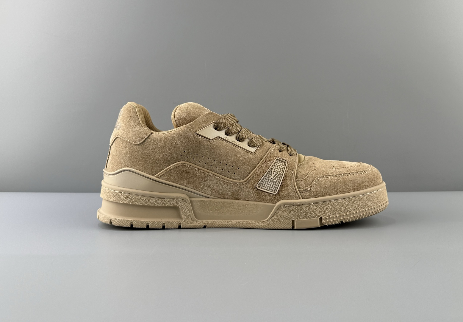 Louis Vuitton LV Trainer in light coffee brown with hang tag. Made from imported Italian cow suede/leather using top-level craftsmanship