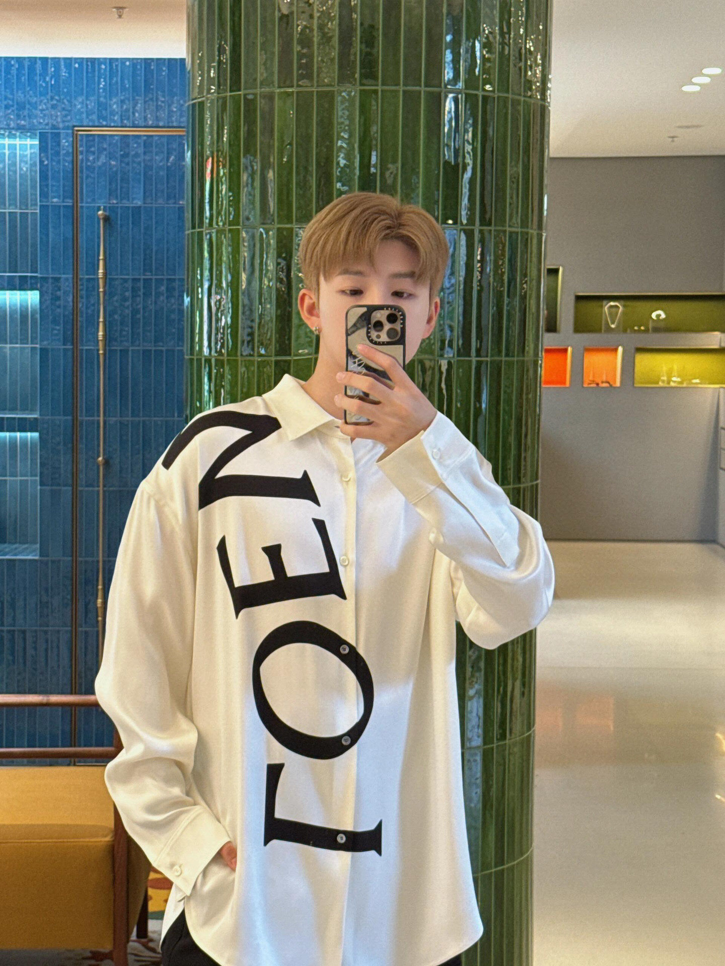 Lew printed silk shirt The custom-made mulberry silk material has a natural luster, with ivory white as the background color, and the black Lew letters printed diagonally on it with ink shadow give a new visual focus in a very tense posture, using a dynamic and irregular beauty to declare the nobility of the brand. - Image 10