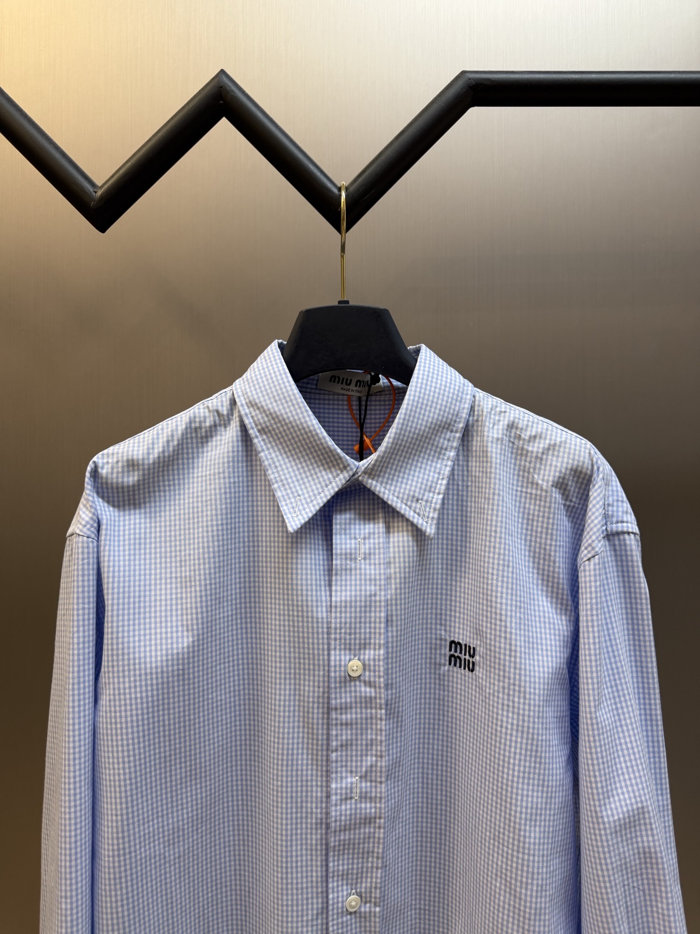 Miu logo checked shirt Custom-woven yarn-dyed jacquard blue and white fine plaid fabric, fine blue and white plaids interwoven vertically and horizontally, classic button-point collar with neat and concise lines, Miu embroidered logo on the left chest with low-key drop printing, and the brand's archives are engraved in every square inch - Image 2