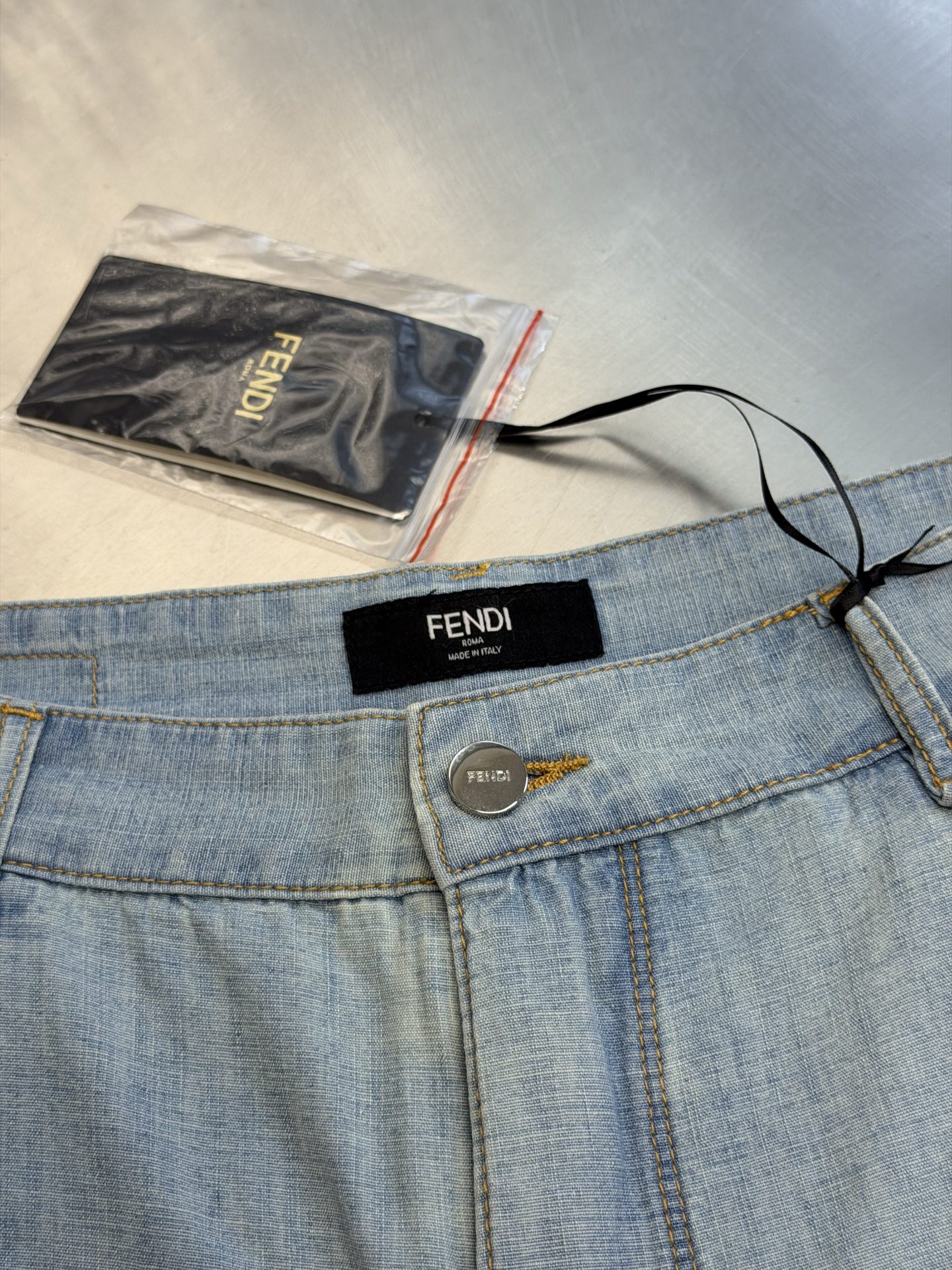 FD jeans with leather logo patch Select 100% cotton original color denim, using dense twill weave, the cloth has a natural and subtle bamboo texture, the texture is clear, the touch is solid but not bulky - Image 6