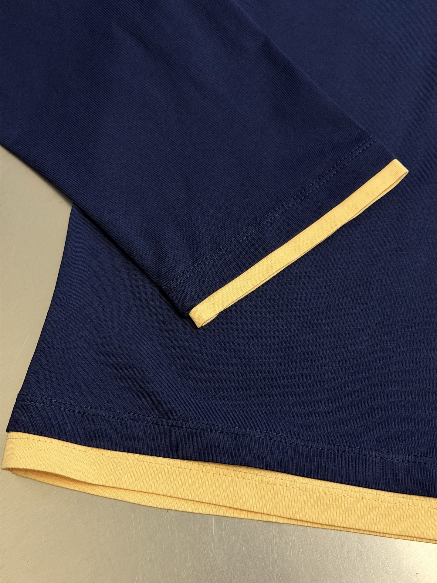 Miu yellow trim sweatshirt long sleeve Pure cotton lightweight knitted fabric, the body is made of 24-count special-spun compact cotton, 185g/m²; it is a medium-high count yarn, and the fabric texture is clear and delicate, with a delicate and smooth surface feel and good drape, achieving an ideal balance between softness and stiffness - Image 8